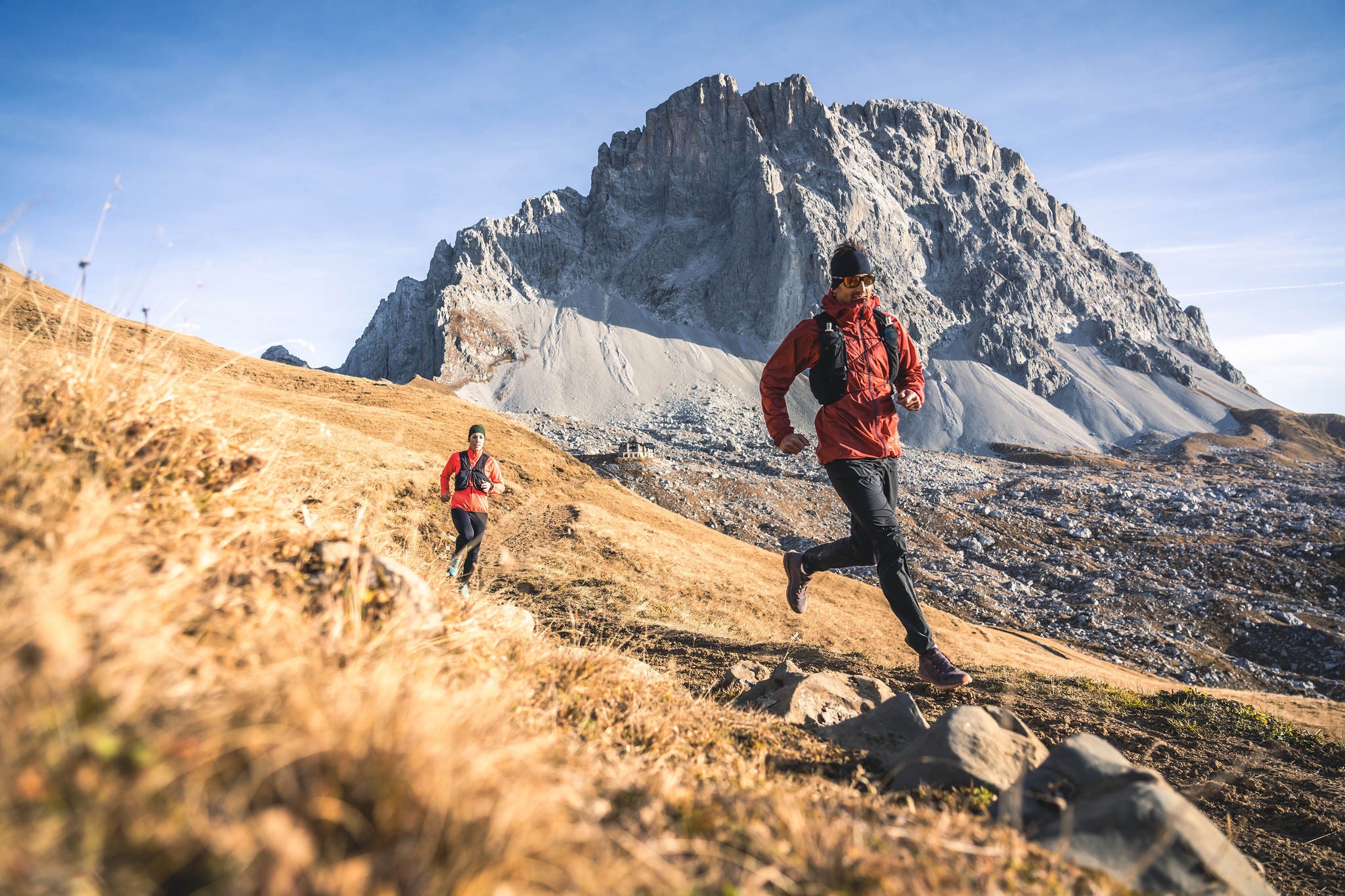 Trail runners in the alps