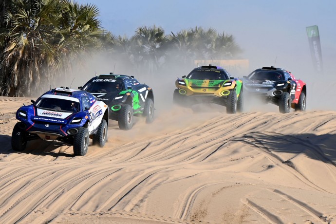 Extreme E drivers race during the Desert X-Prix in March 2023