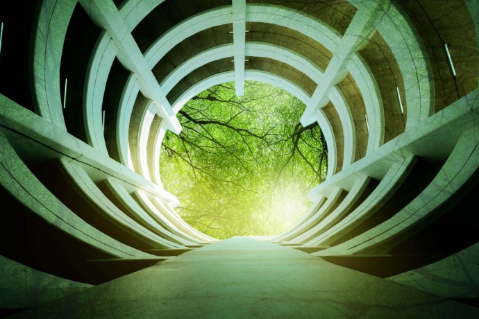 Concrete tunnel to green trees