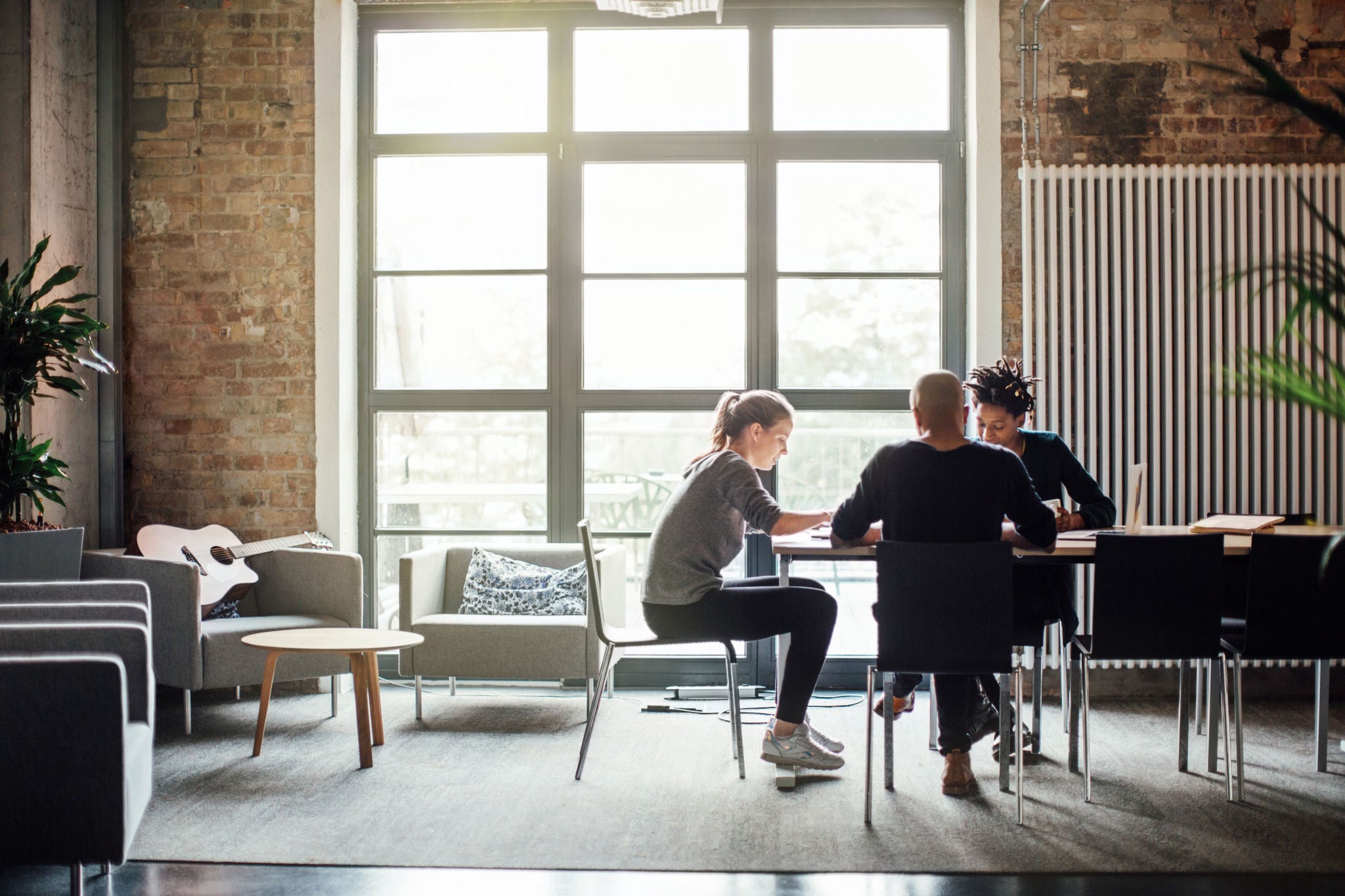 Business colleagues discussing on a meeting table