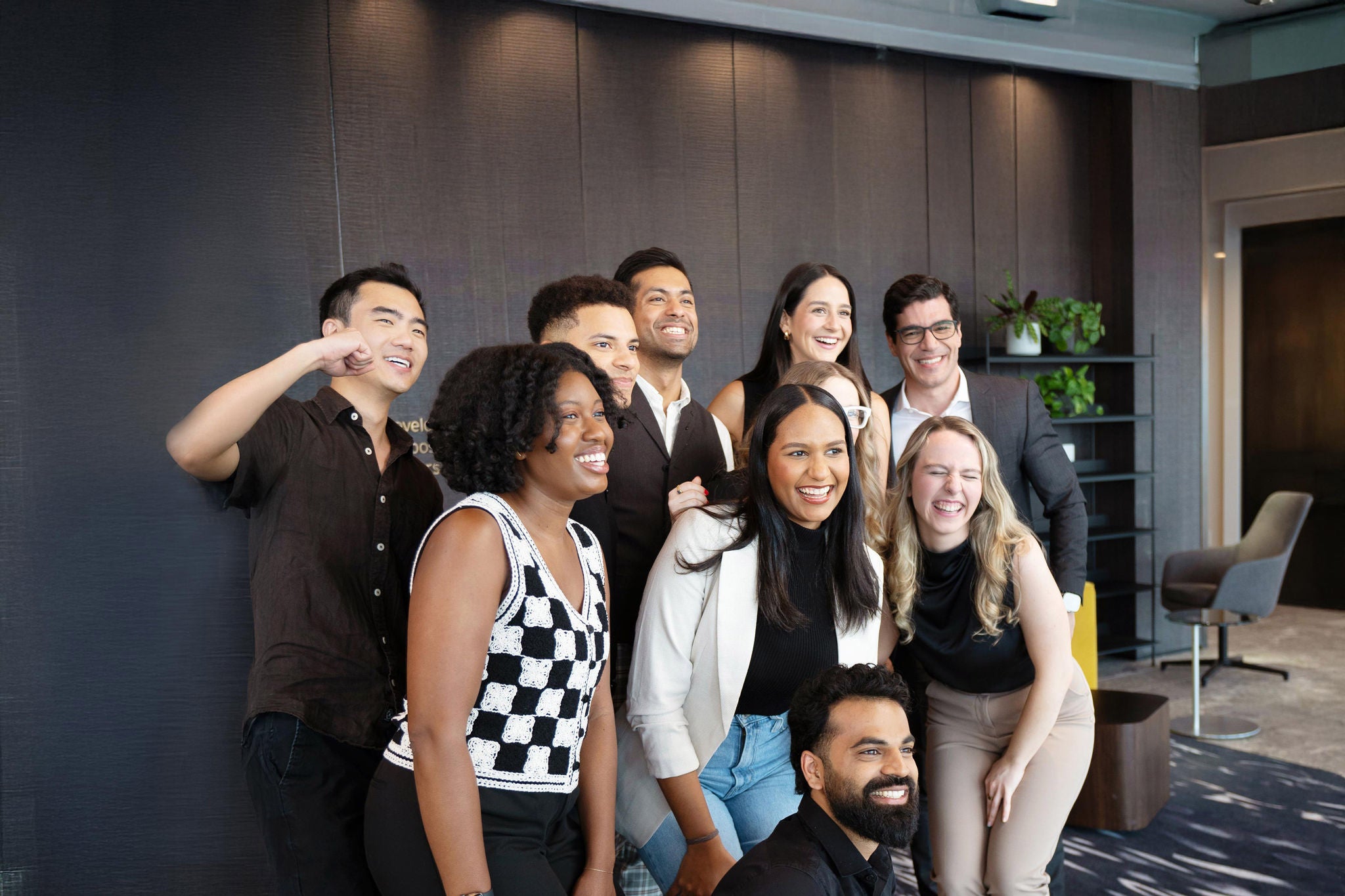 A view of daily work life at EY, employees collaborating, concentrating