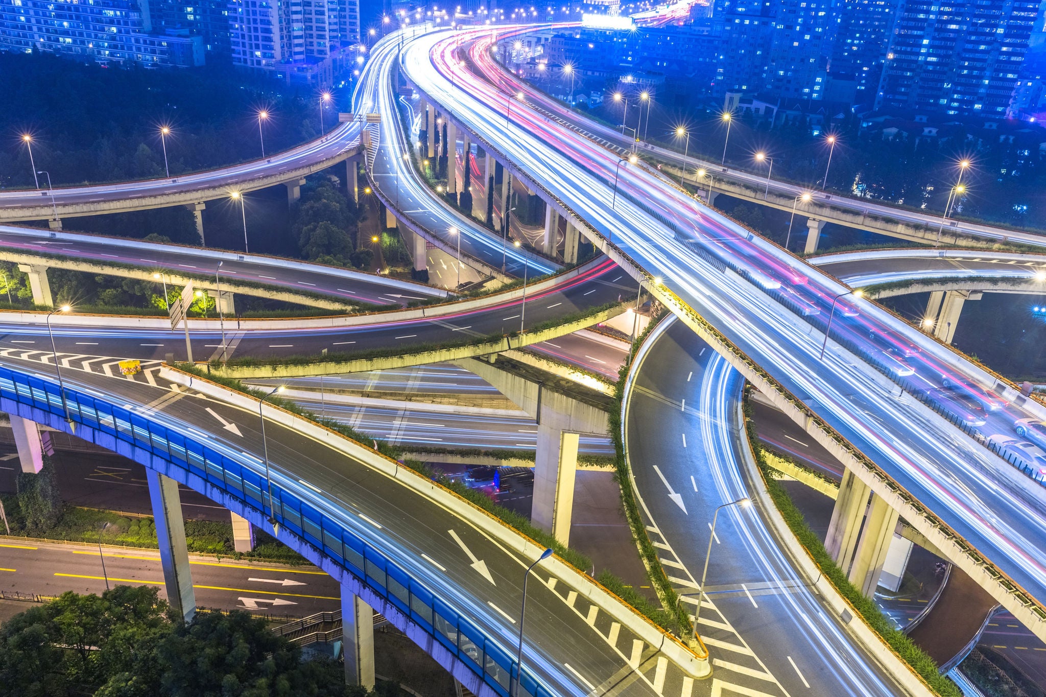 Cowded cars driving at flyover, long exposure.