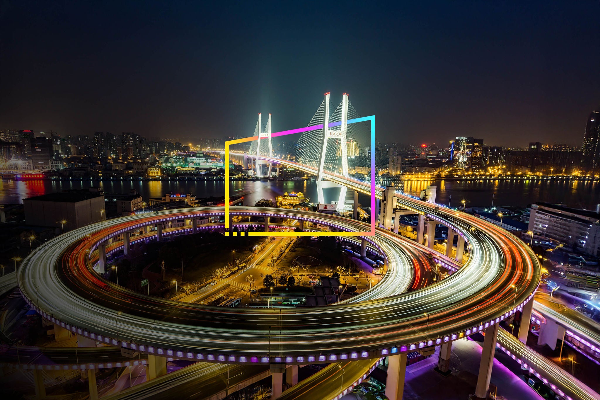 Shanghai Nanpu bridge with traffic lights at night