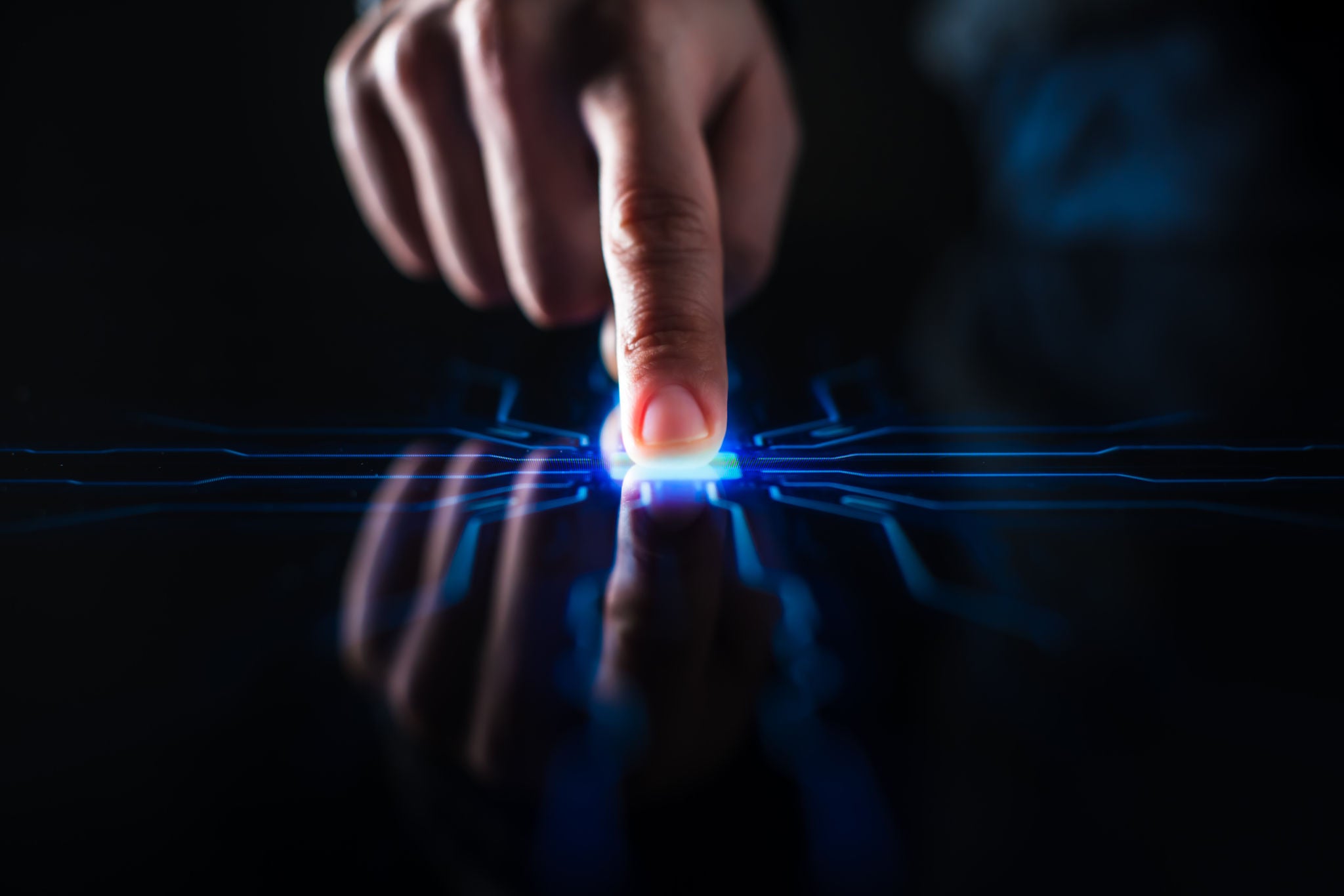 Digitalization Concept: Human Finger Pushes Touch Screen Button and Activates Futuristic Artificial Intelligence. Visualization of Machine Learning, AI, Computer Technology Merge with Humanity