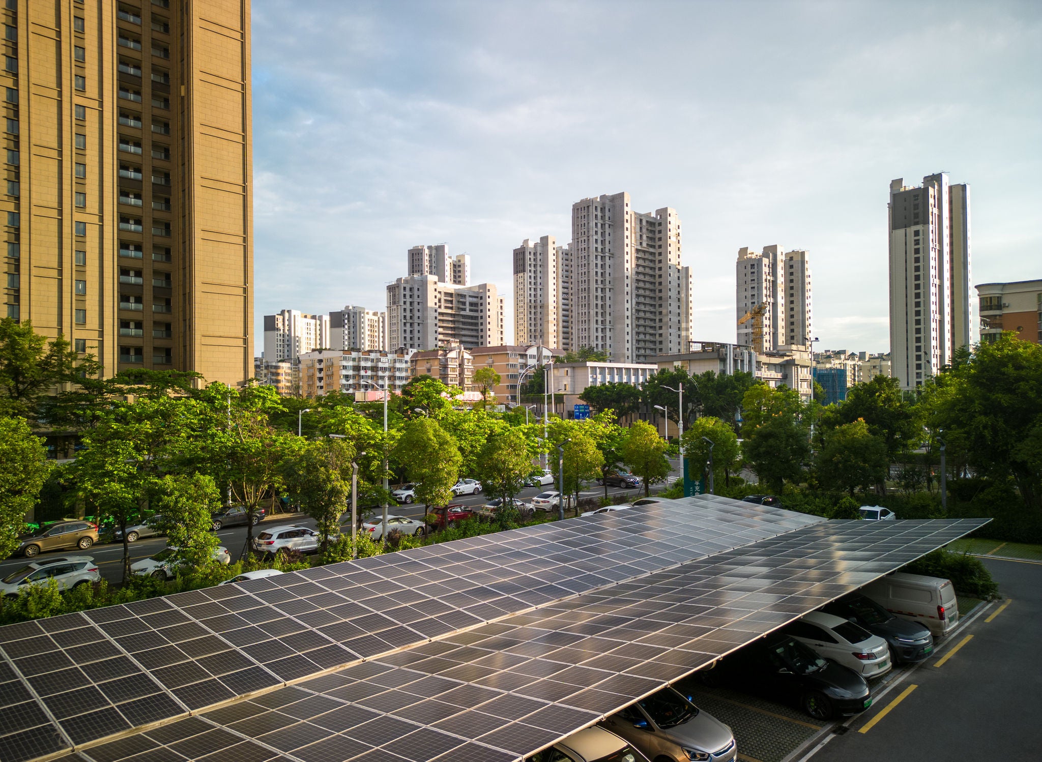 Urban parking lot uses solar panels as roof
