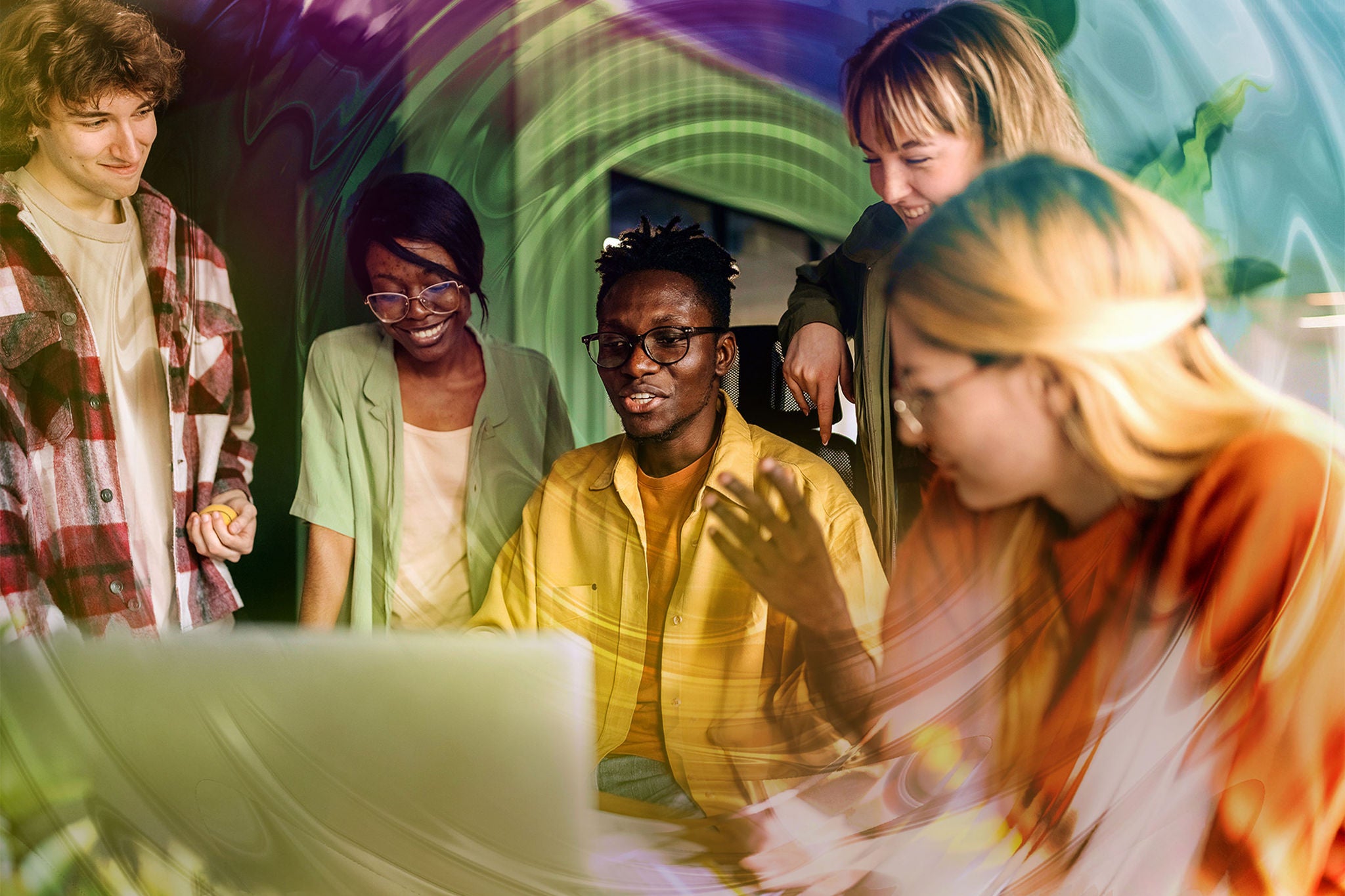 Diverse male and female in a casual office or co-working space interact.