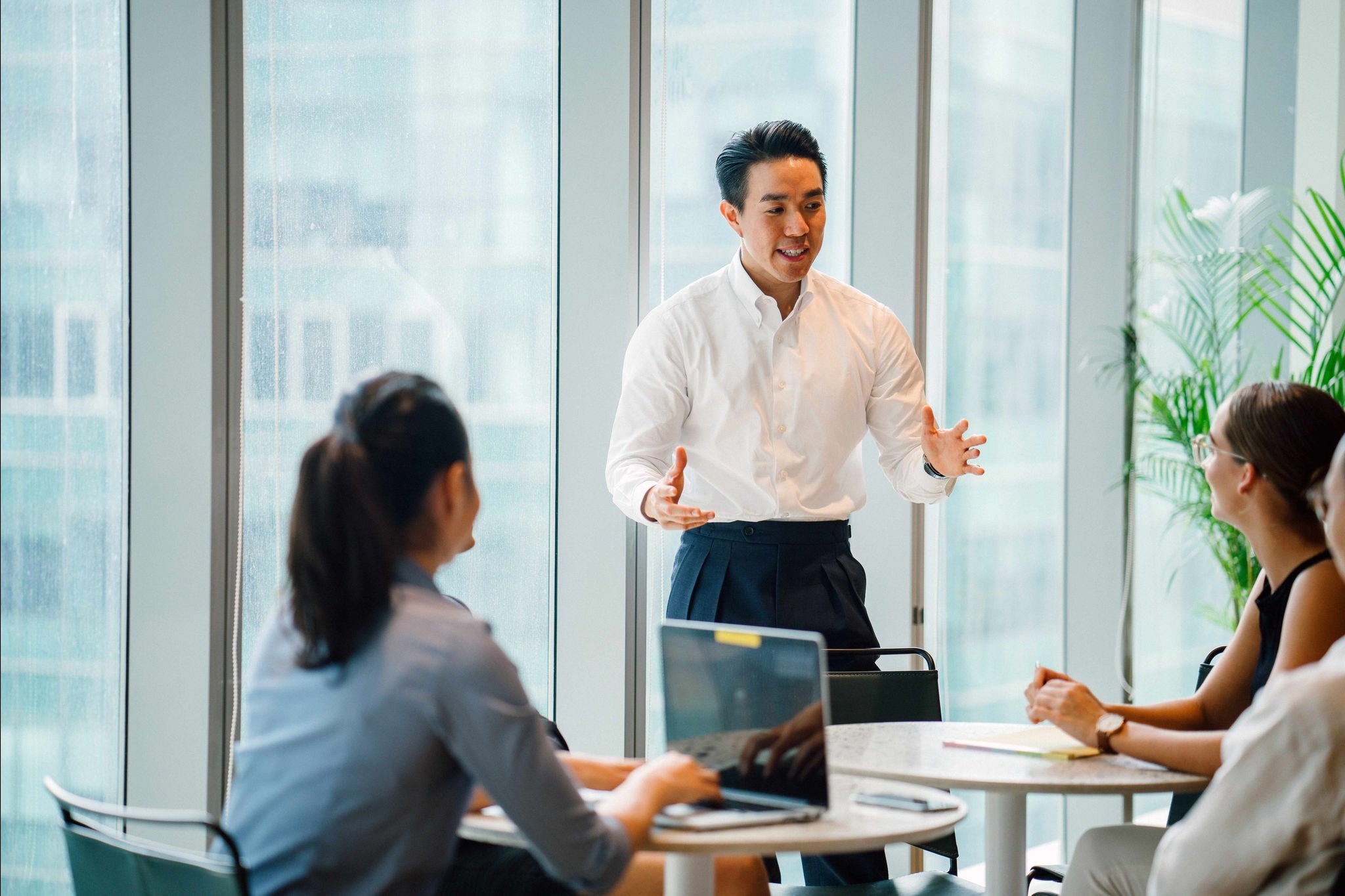 Person presenting at a meeting