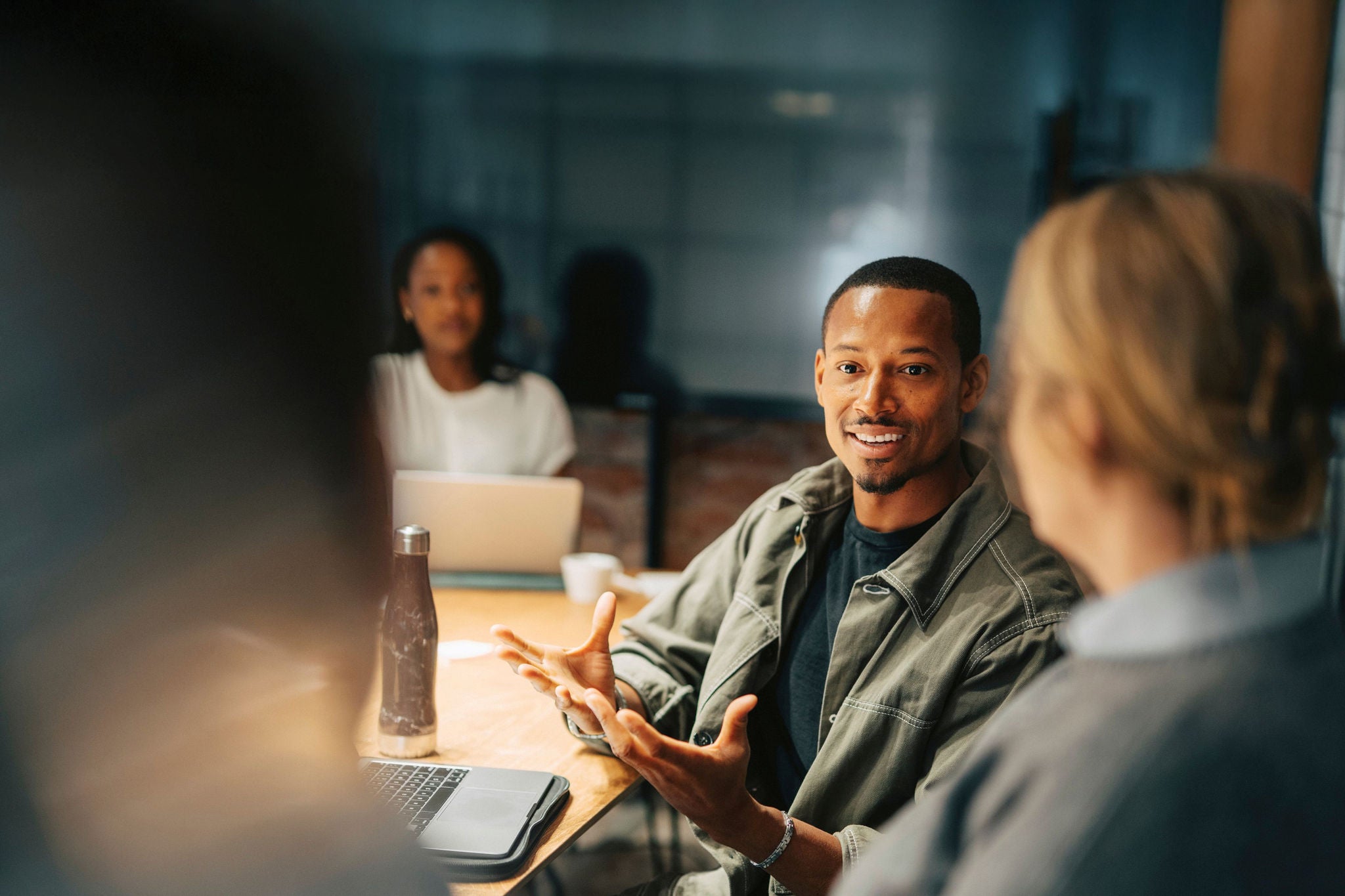 Man speaking and explaining during a meeting