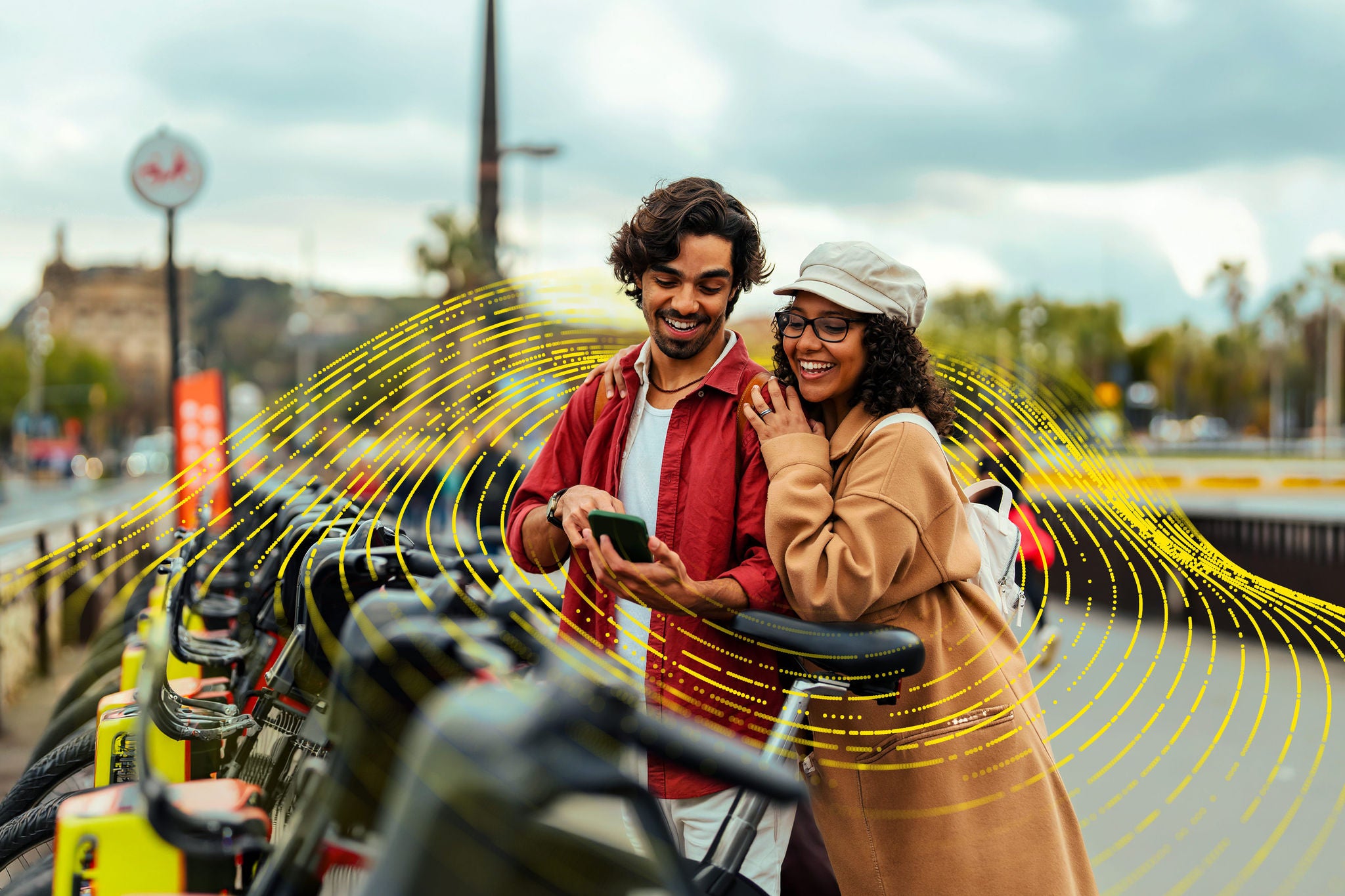 Bike-share users checking a mobile app