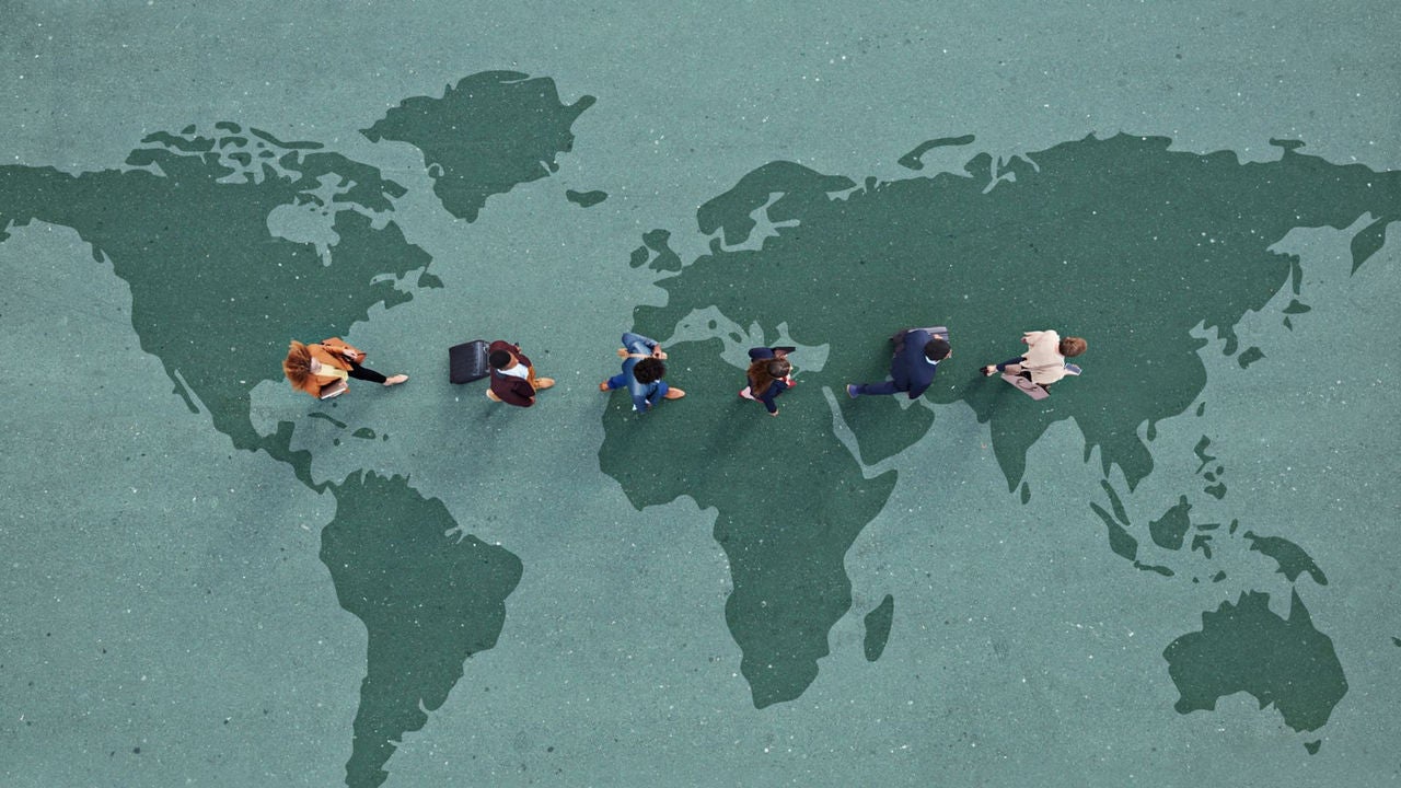Group of young adults, photographed from above, on various painted tarmac surface, at sunrise.