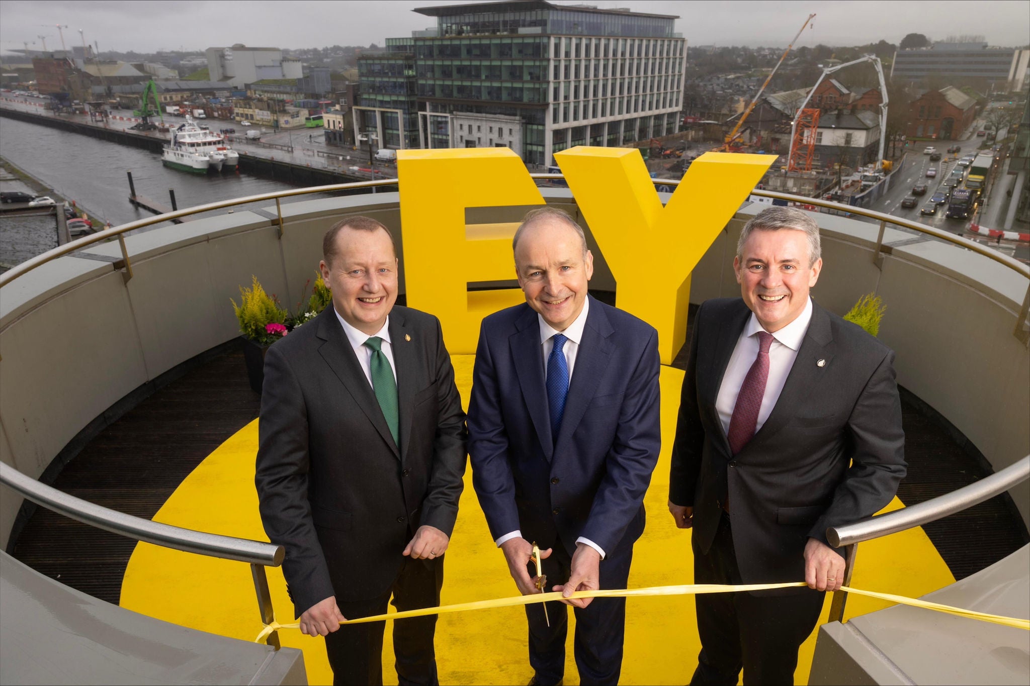 L-R: Ronan Murray EY Cork Managing Partner, Taoiseach Micheál Martin and Frank O'Keefe EY Ireland Managing Partner