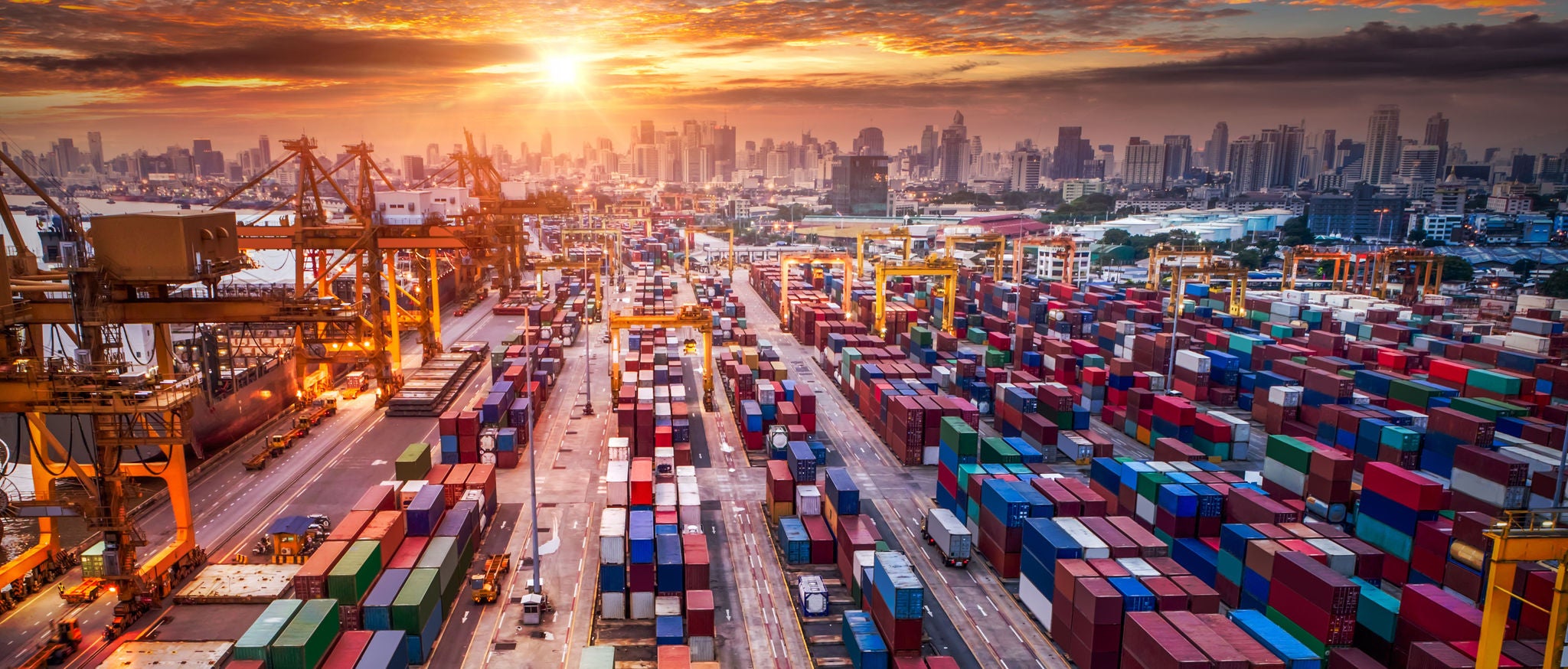 Container ship in import export and business logistic, By crane, Trade Port, Shipping cargo to harbor, Aerial view from drone, International transportation, Business logistics concept