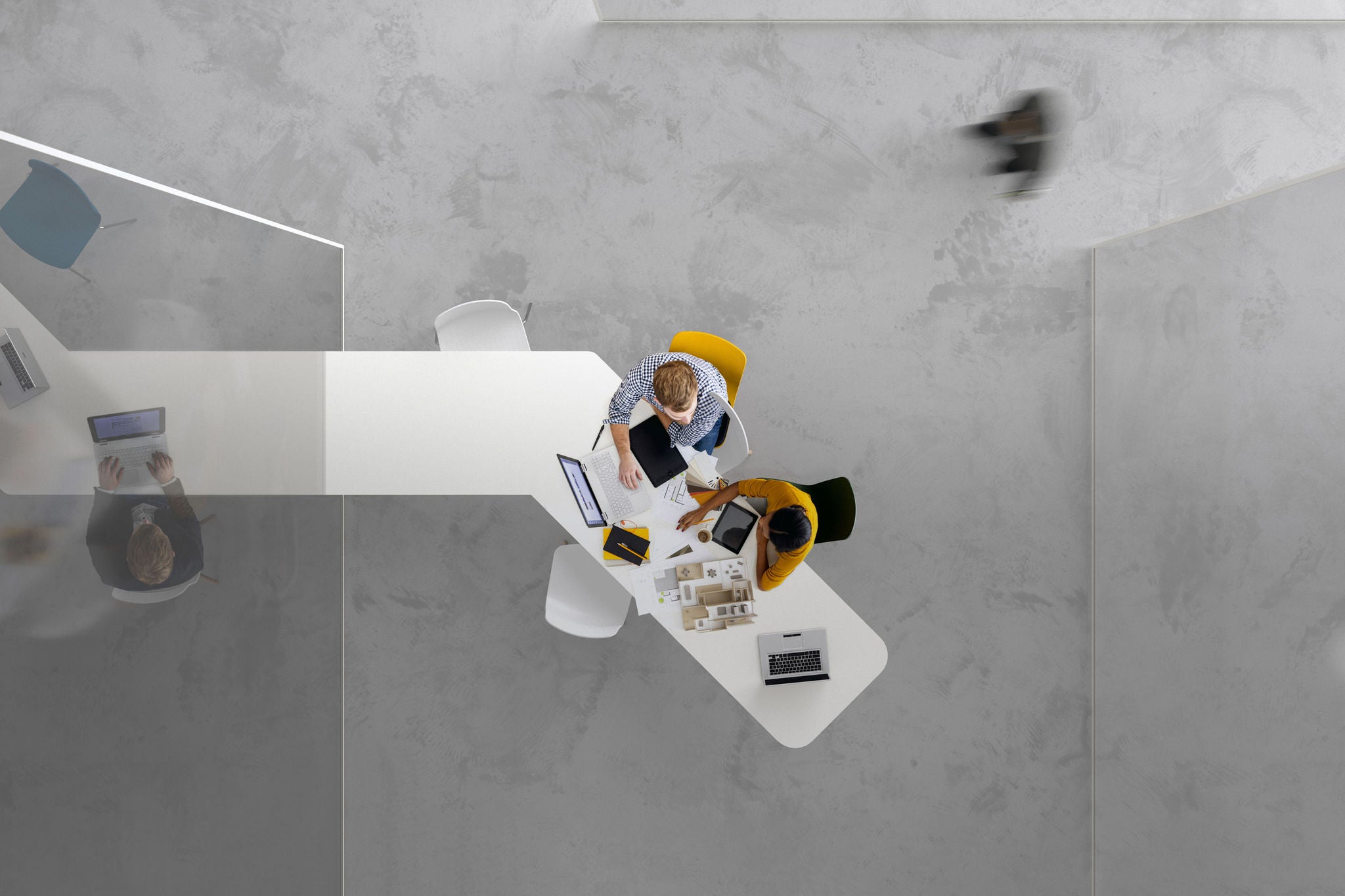 Overhead view of people working in a modern office background