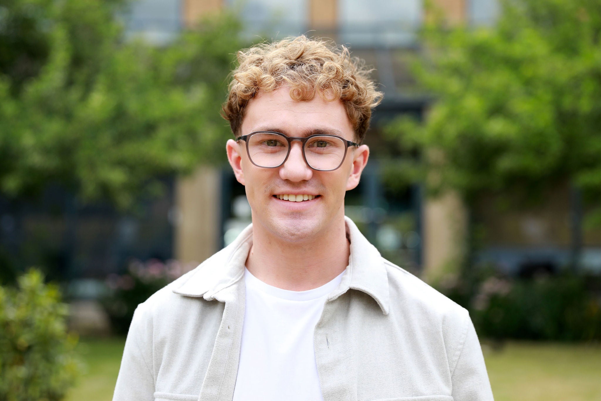Person smiling to the camera