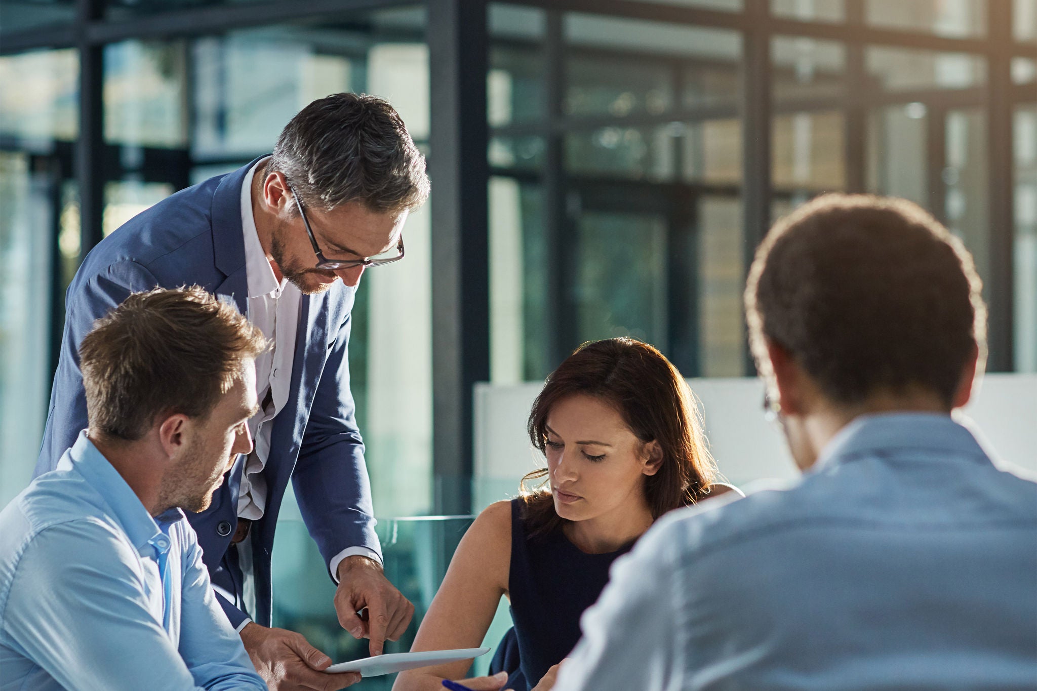 A group of people in a meeting. Professional business people working together