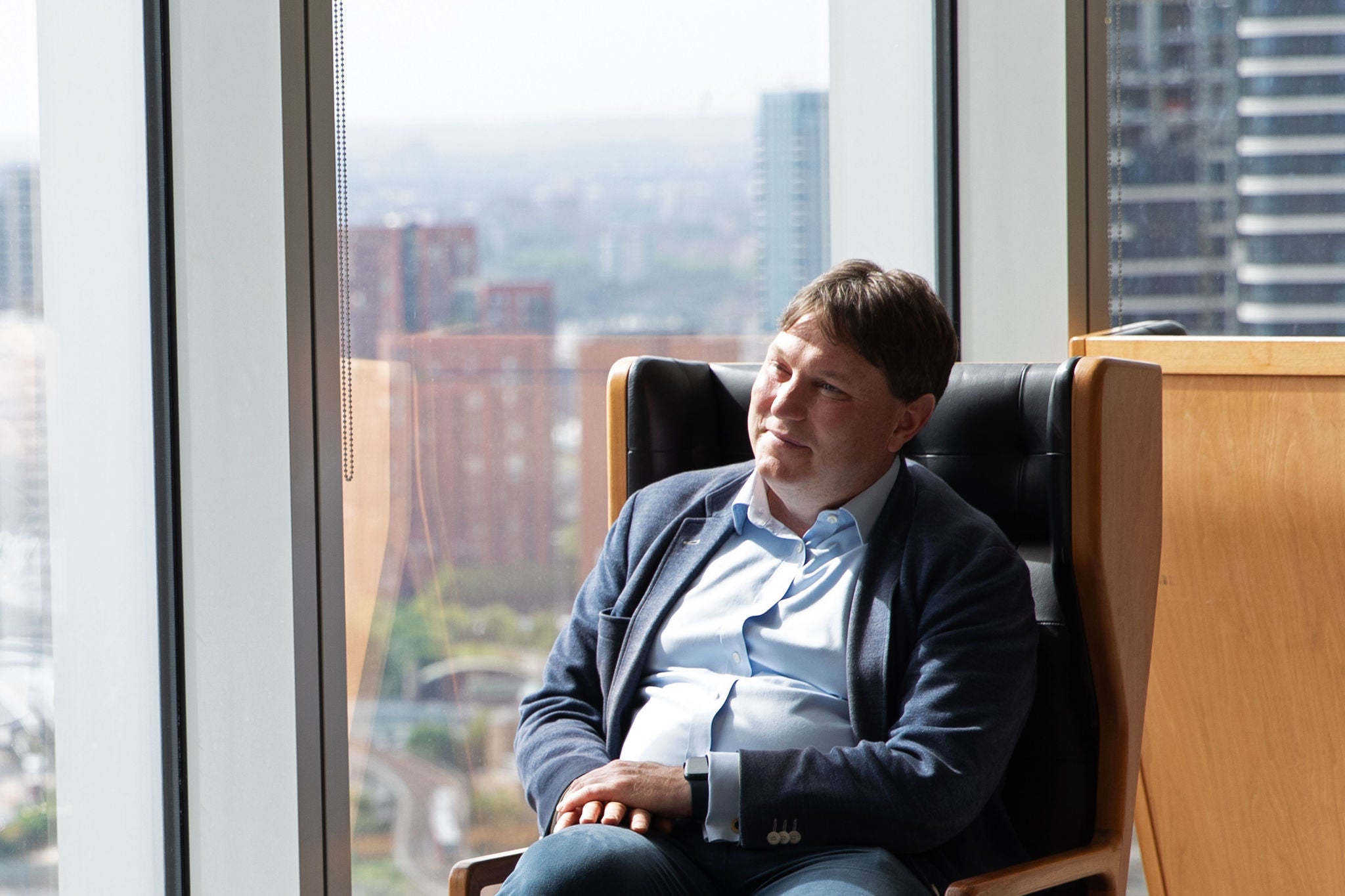 Person sitting in the office smiling