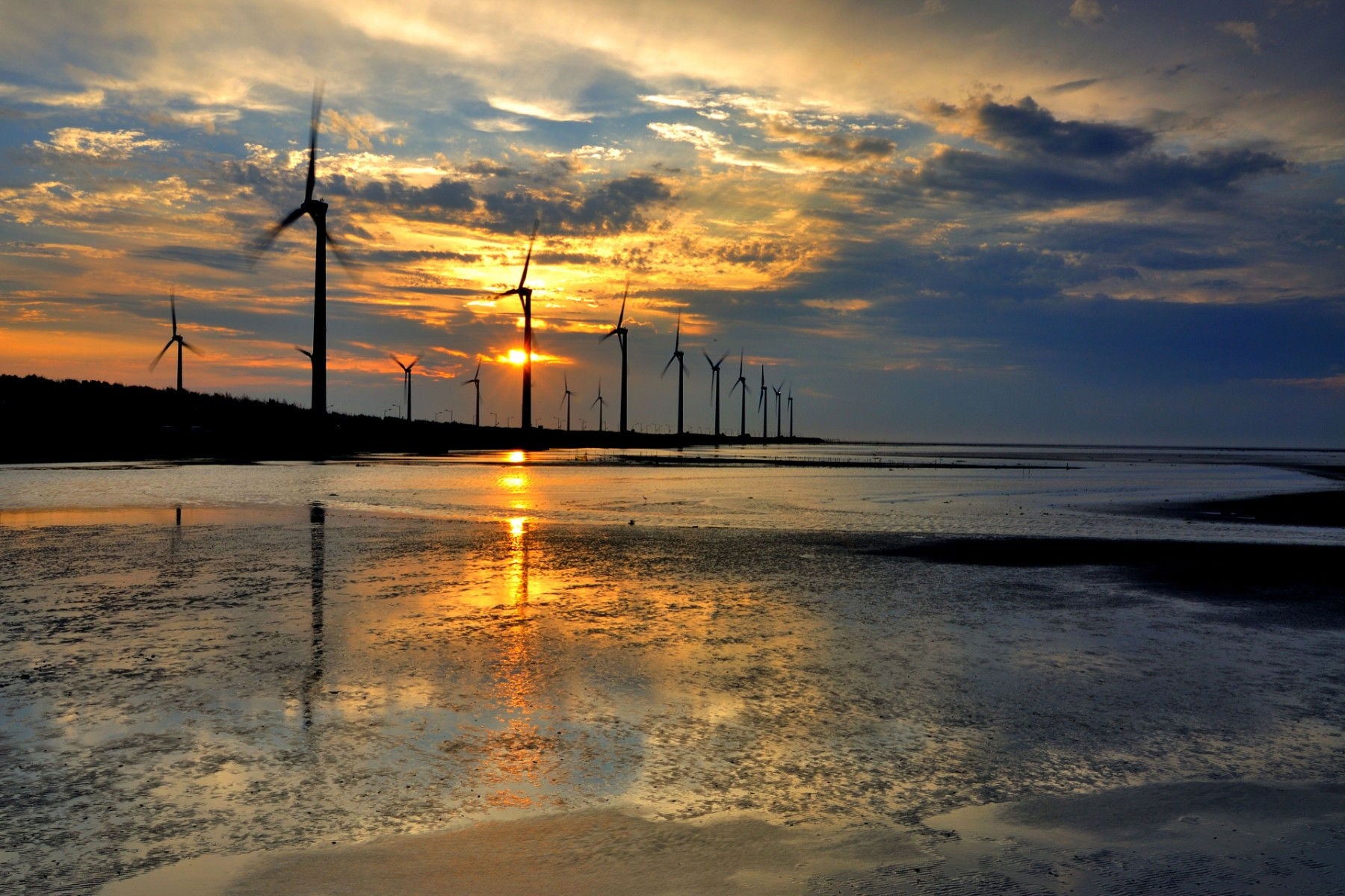 ey-wind-power-plant-sunset-beach