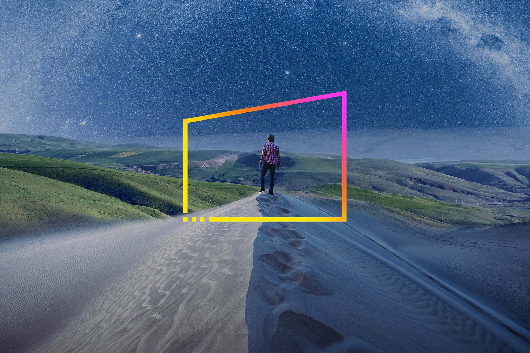 man hiking in the desert at night under the milky way