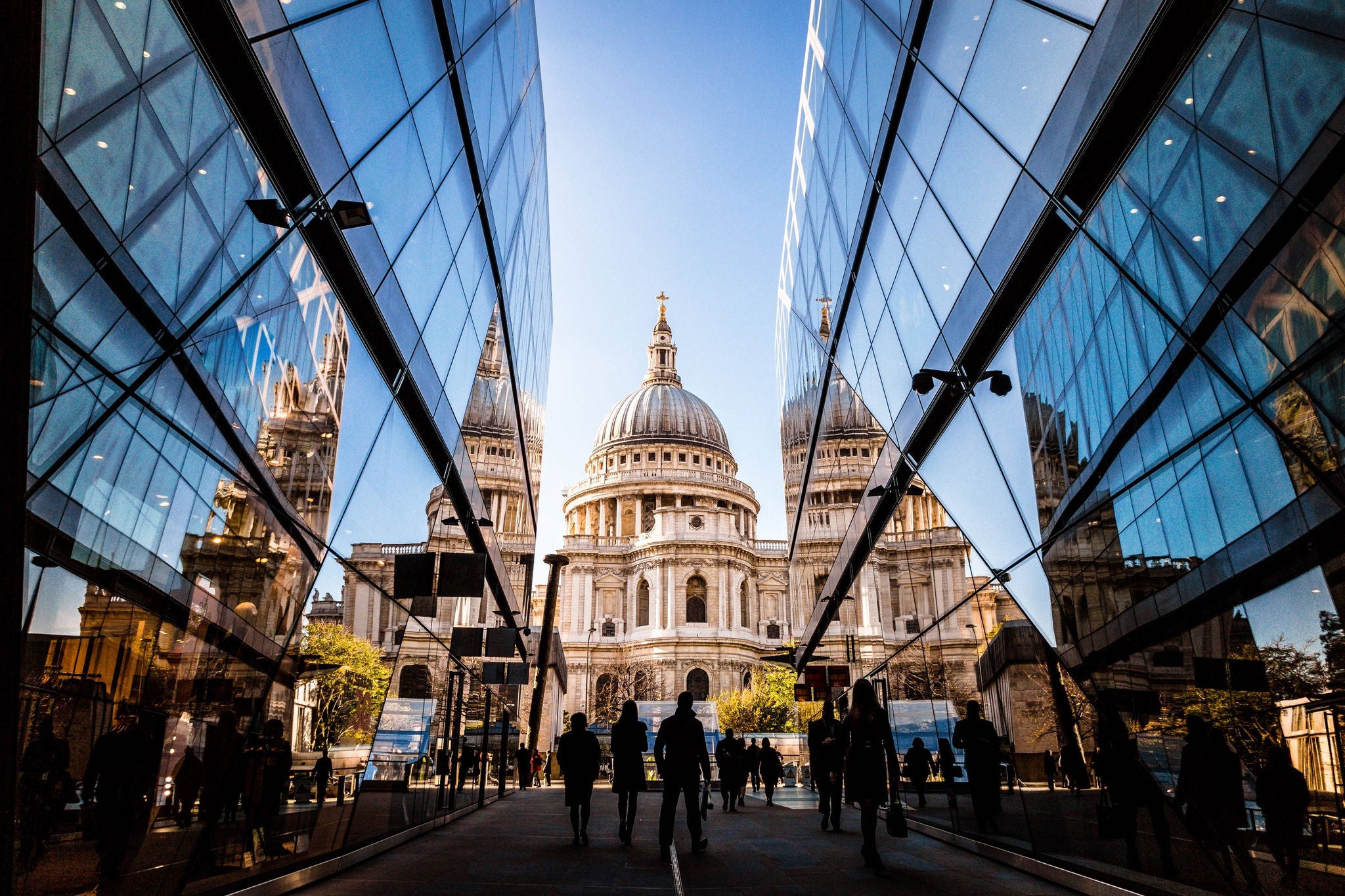Urban crowd and futuristic architecture in London