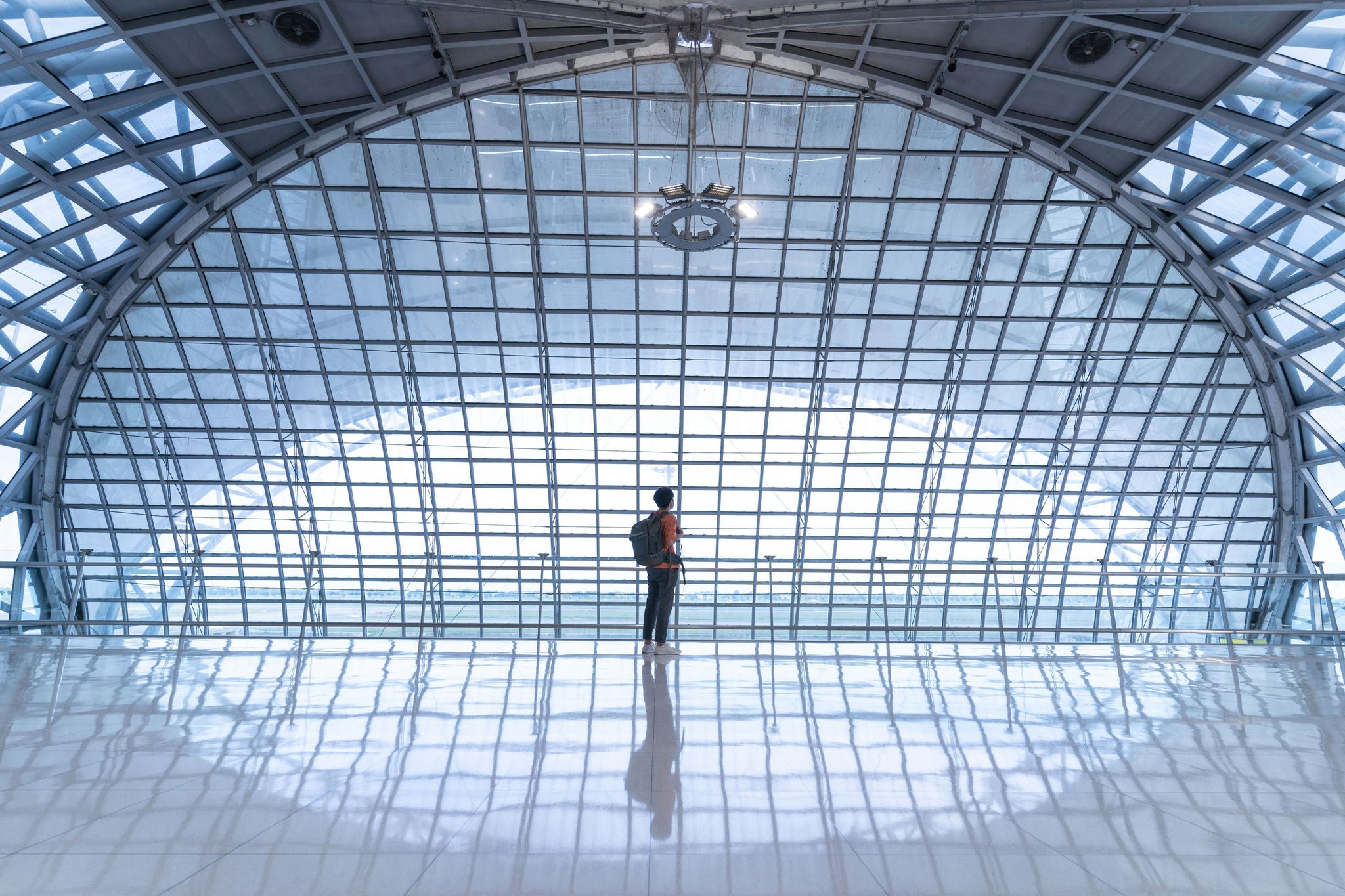 Traveler with a backpack in an airport