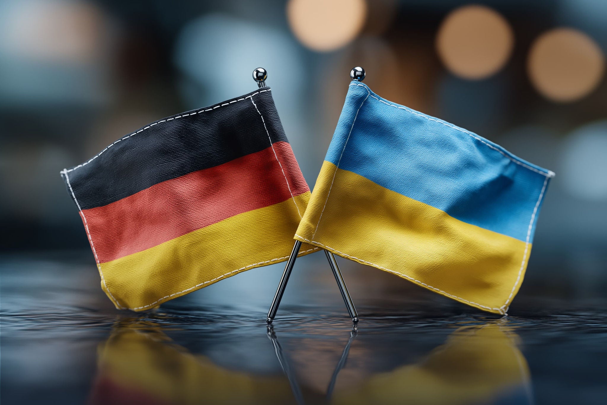 German and Ukrainian flags side by side