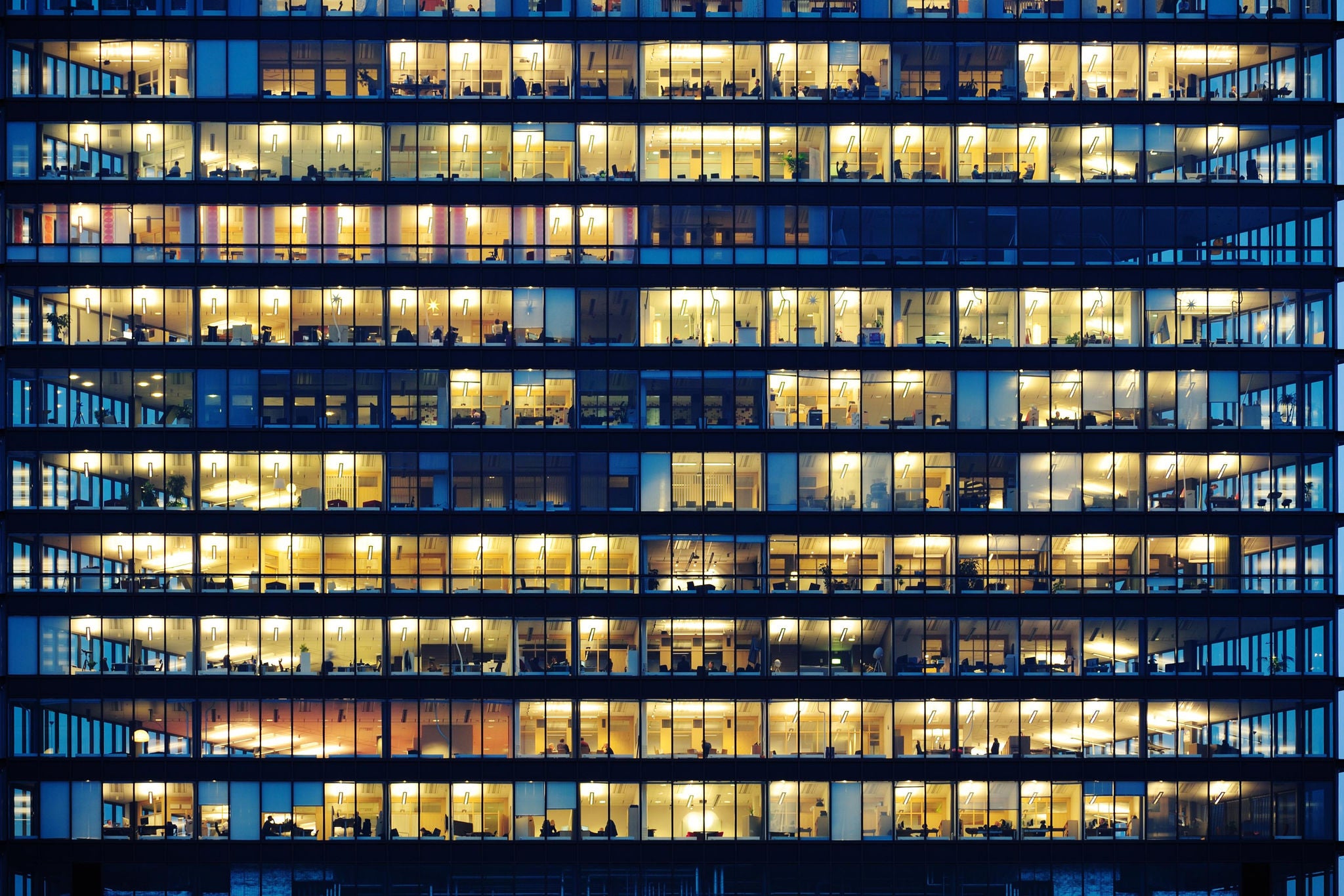 Office windows by night workers working late