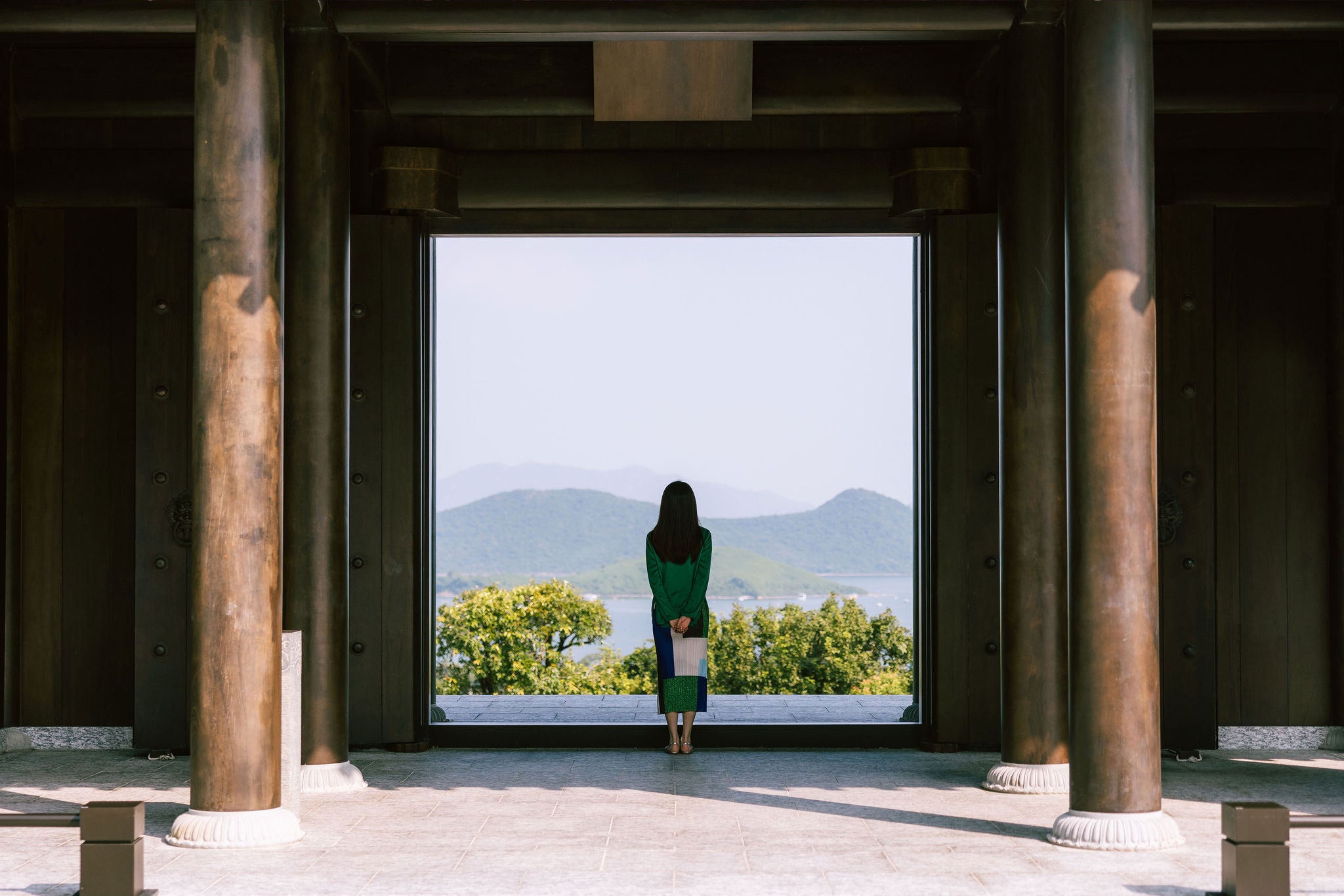 Woman contemplating landscape