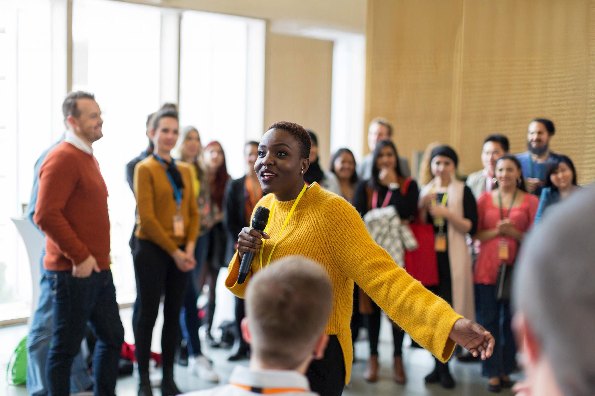 Female speaker with microphone