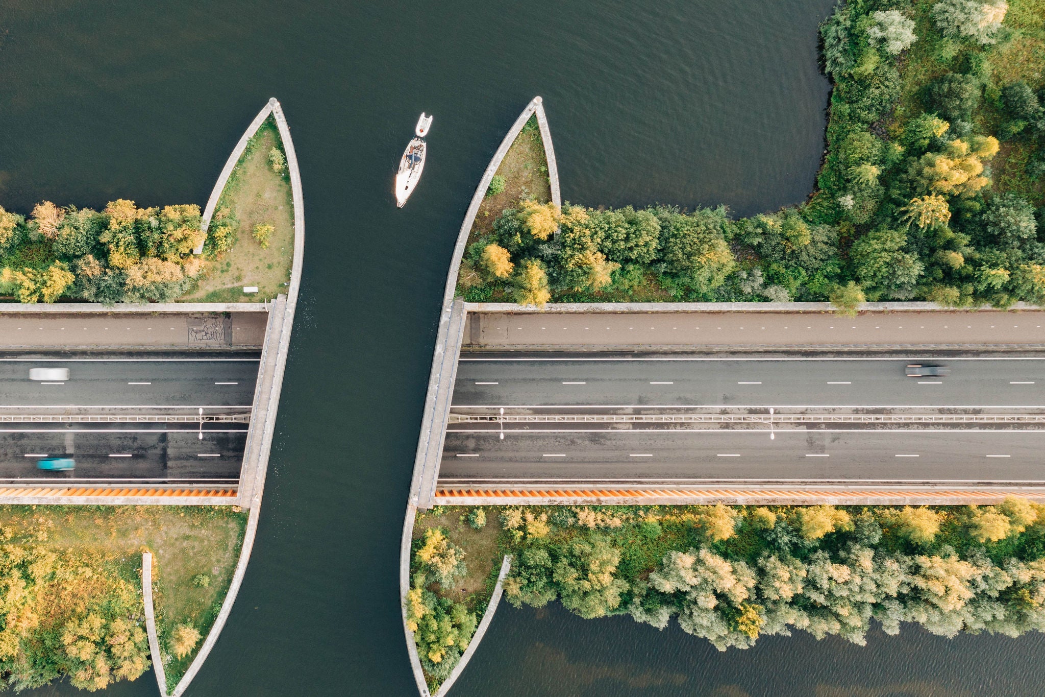 A yacht passing through the unique aqueduct