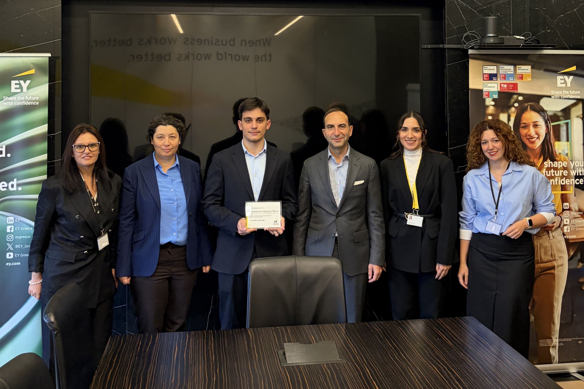 ey assurance team with university student