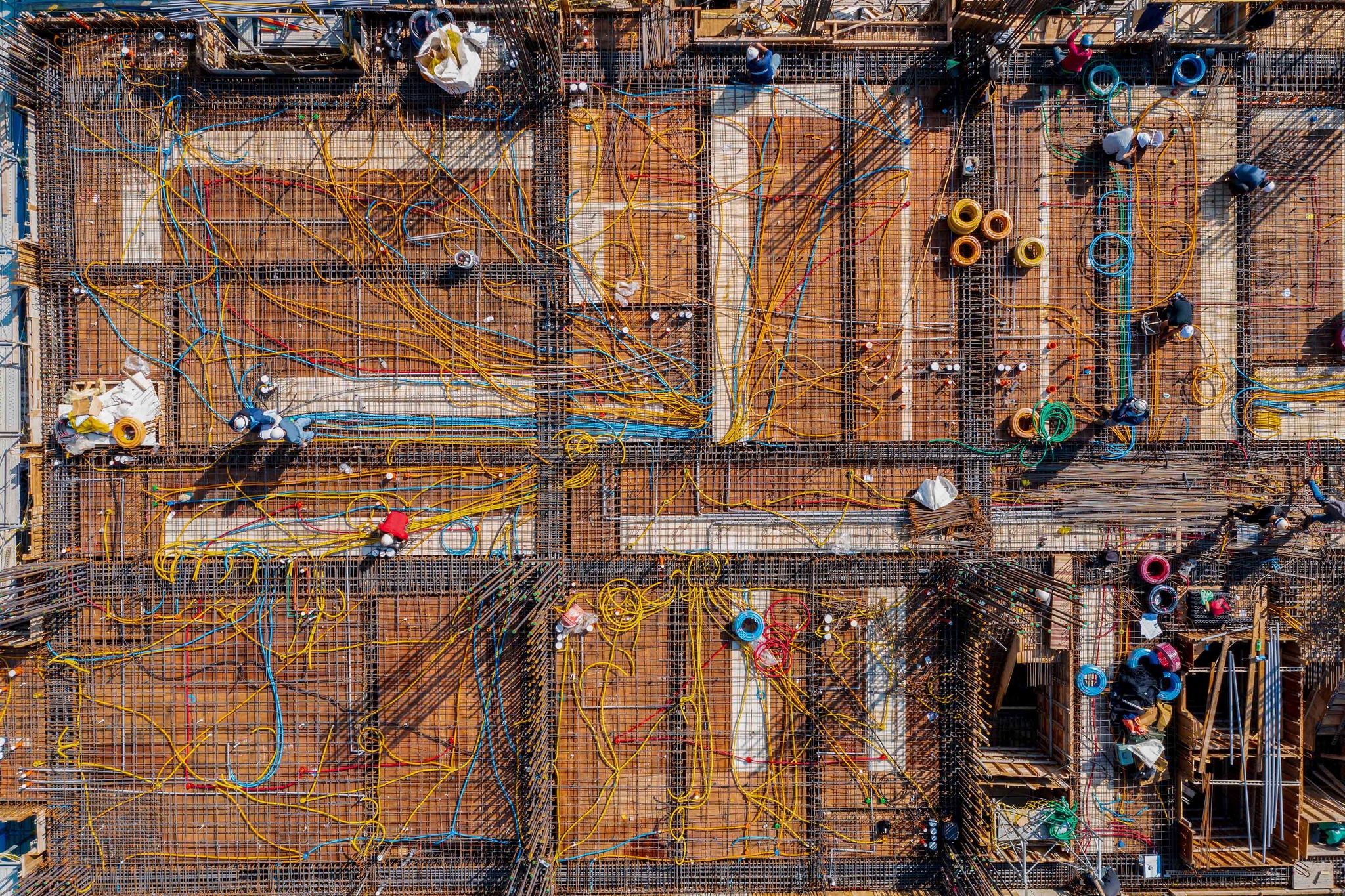 A building construction site focused on wiring installation