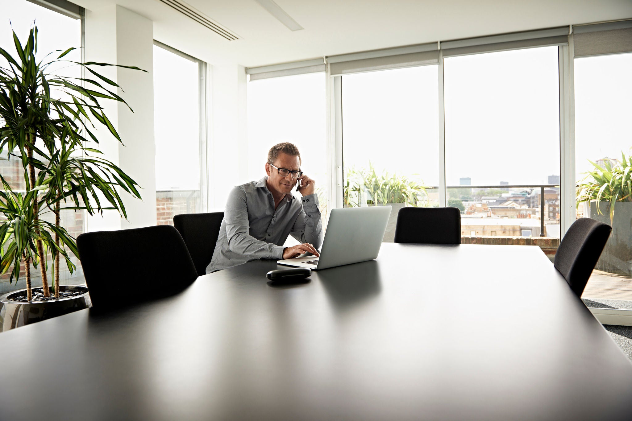 Businessman working in modern apartment
