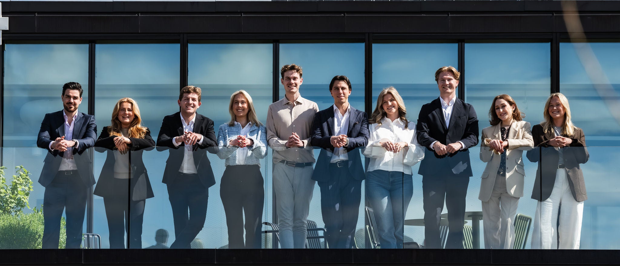 Early career professionals connecting in a collaborative workplace