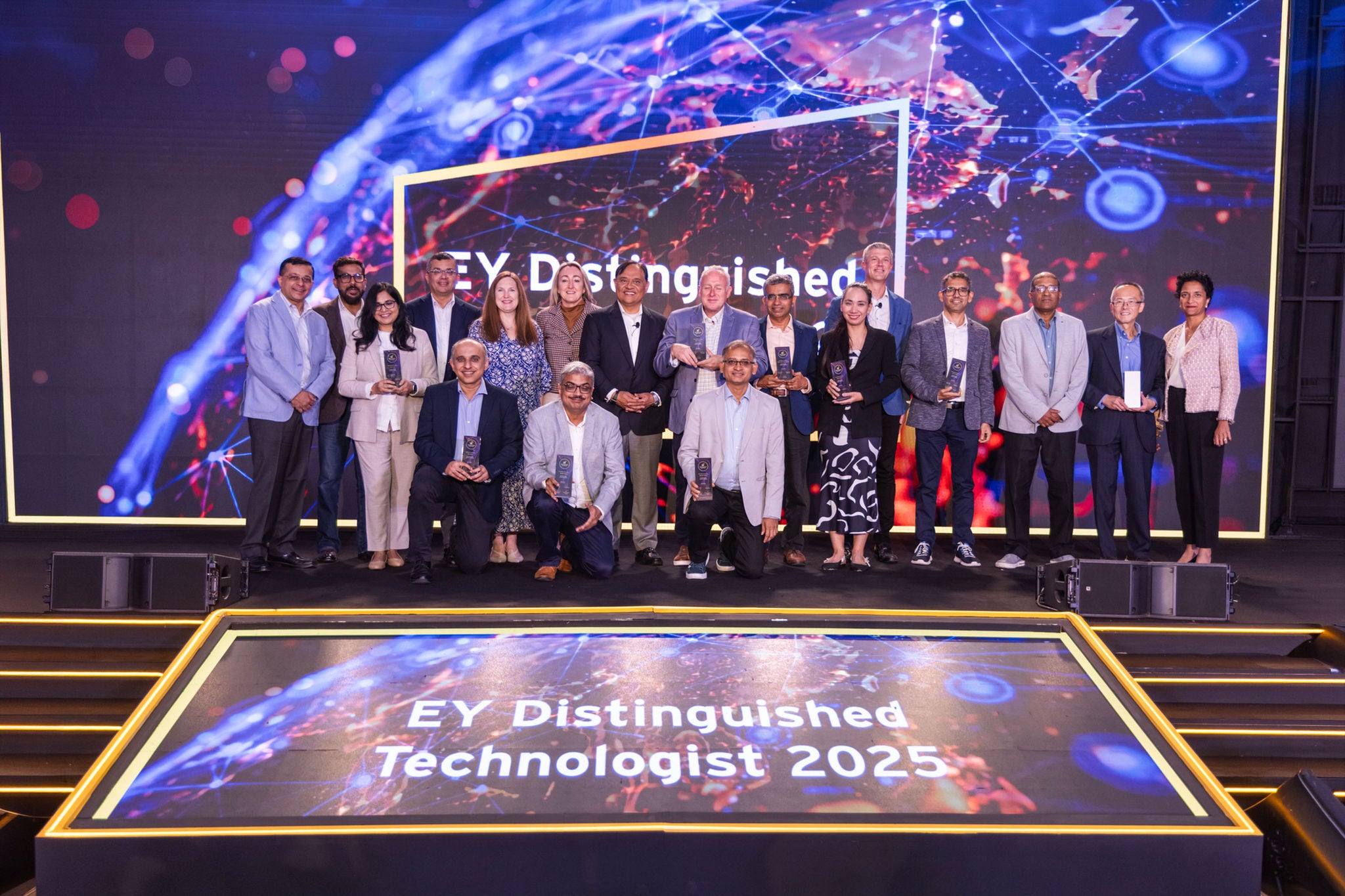 A group shot of EYs Distinguished Technologists at an awards ceremony
