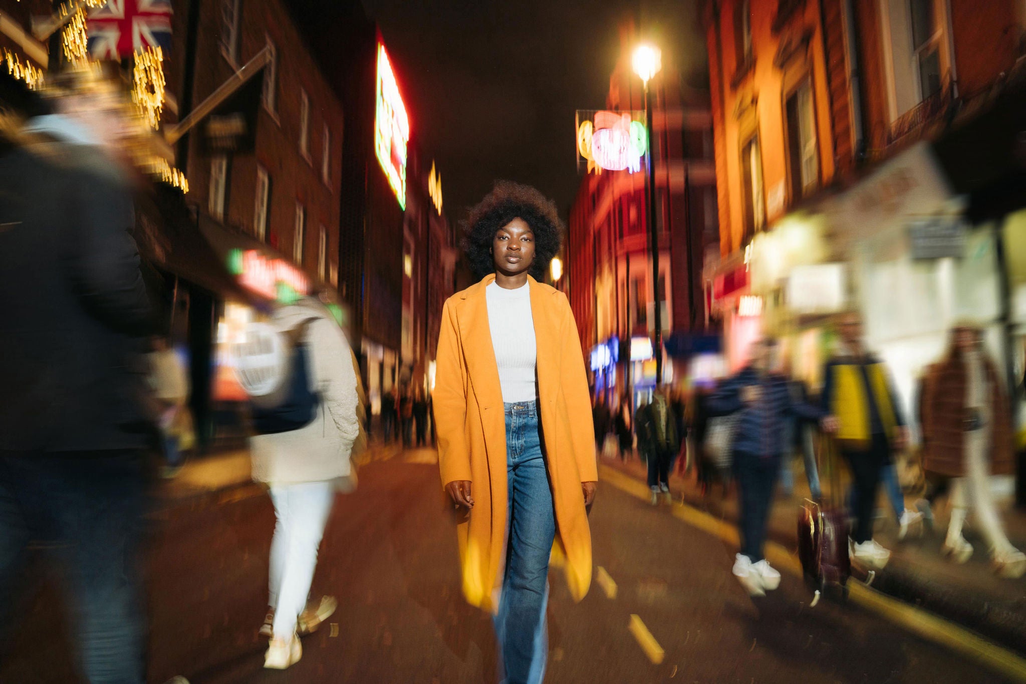 Nightlife Concept. Woman Walking On The Street.