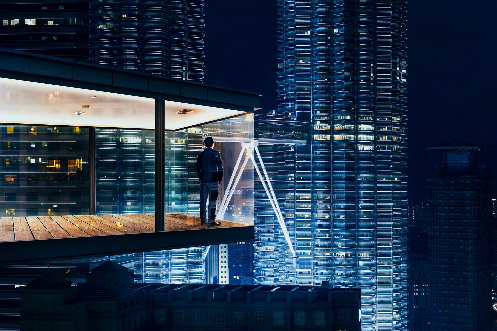 ey businessman modern office night city skyline
