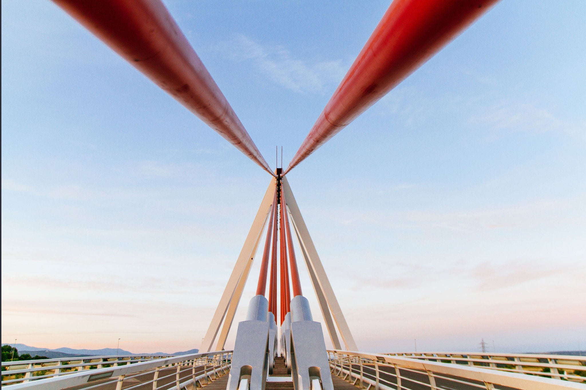 Low angle looking up the cables of a modern suspension bridge