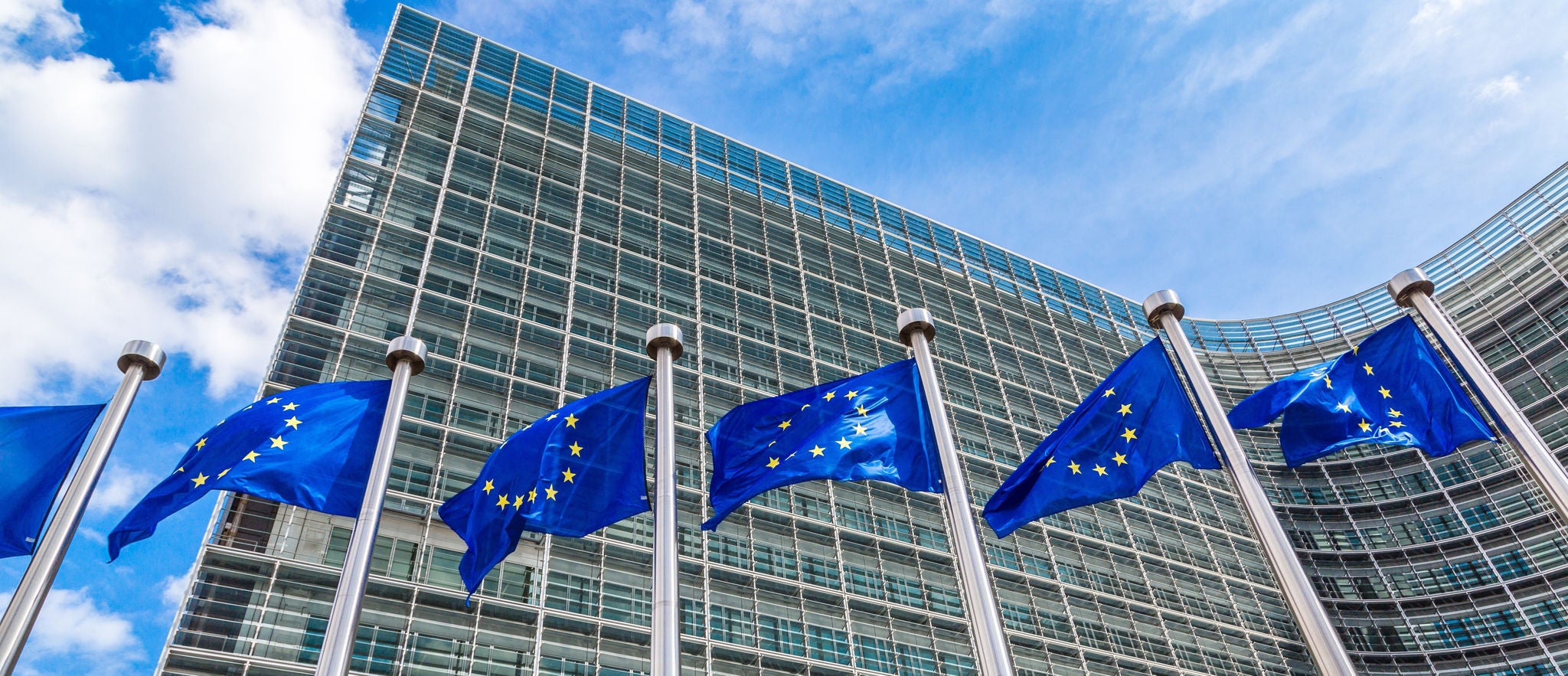 European flags in front of  headquarters of European commission in Brussels