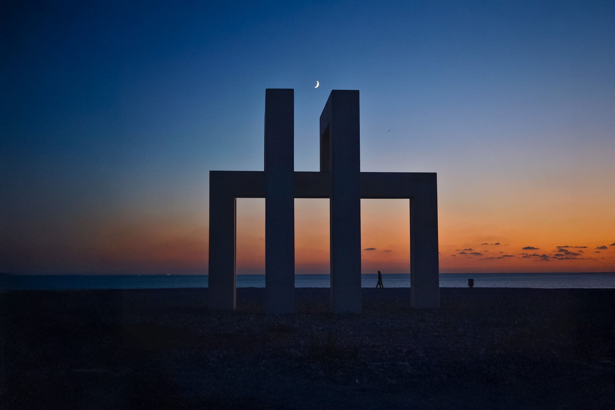 SCENIC VIEW OF SEA AGAINST ORANGE SKY