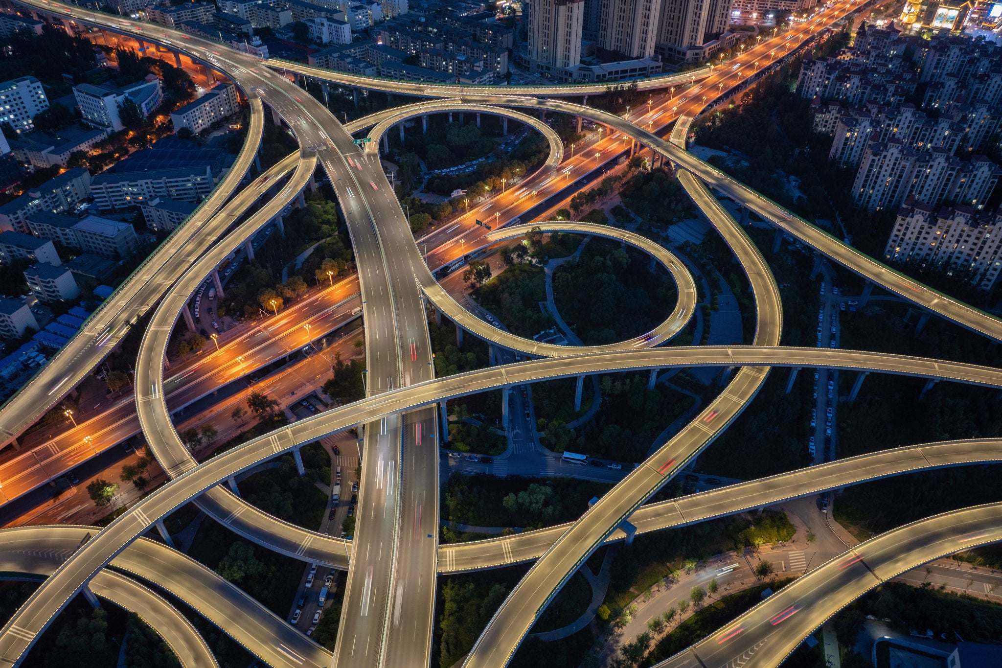 Aerial view of a glowing complex highway