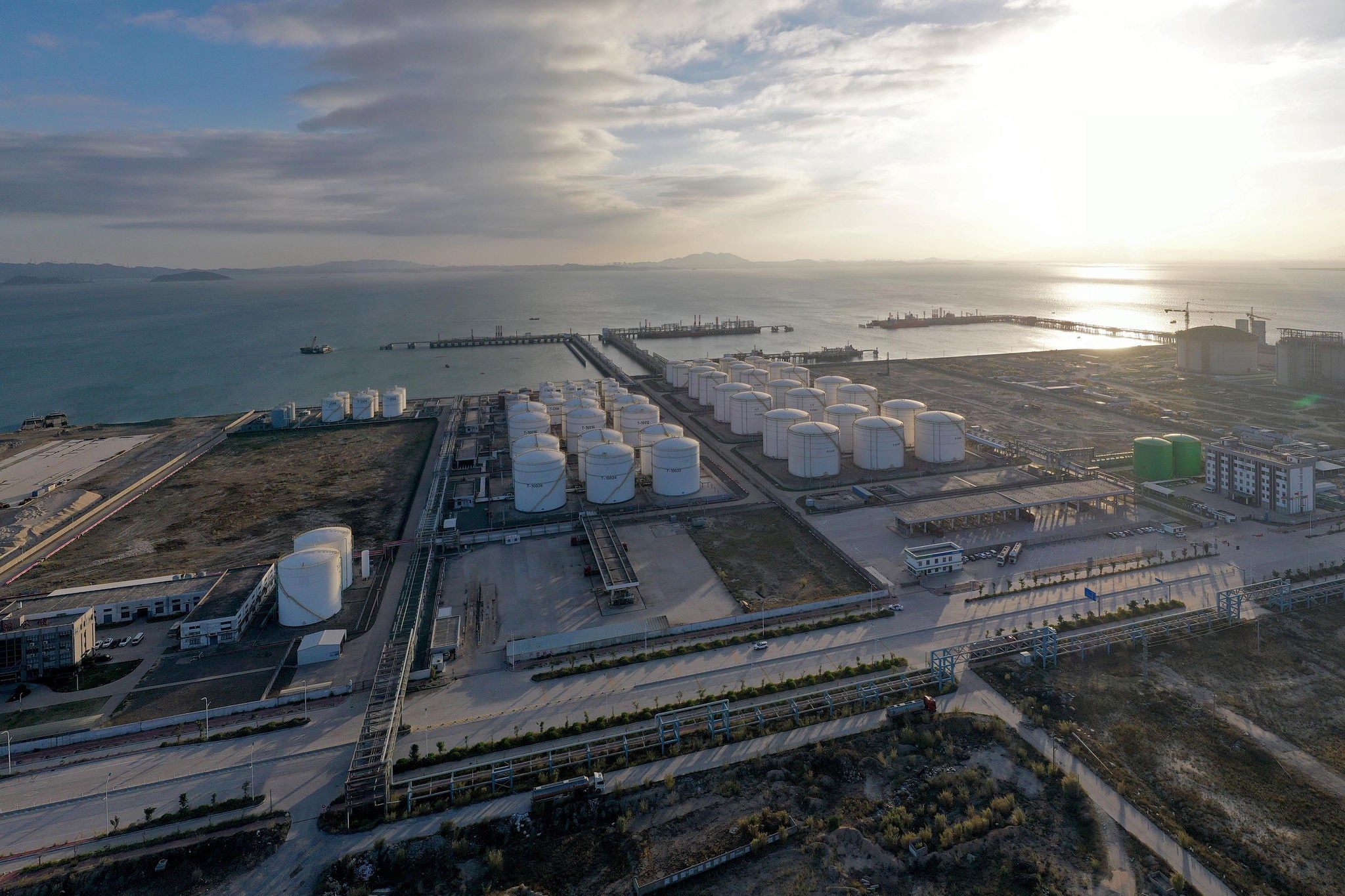 Aerial view of hydrogen tank terminal at sea