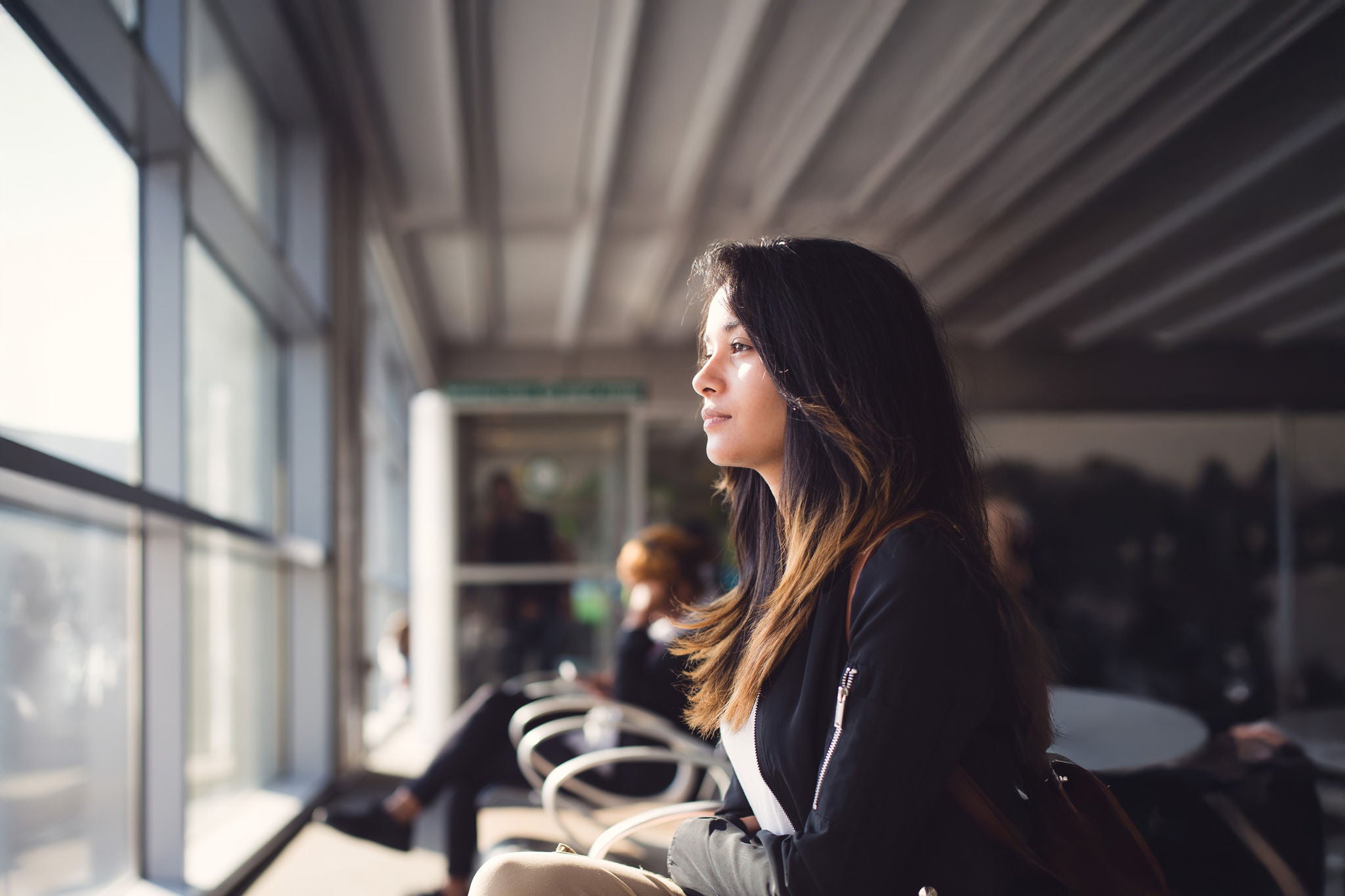 Young woman at airport lounge