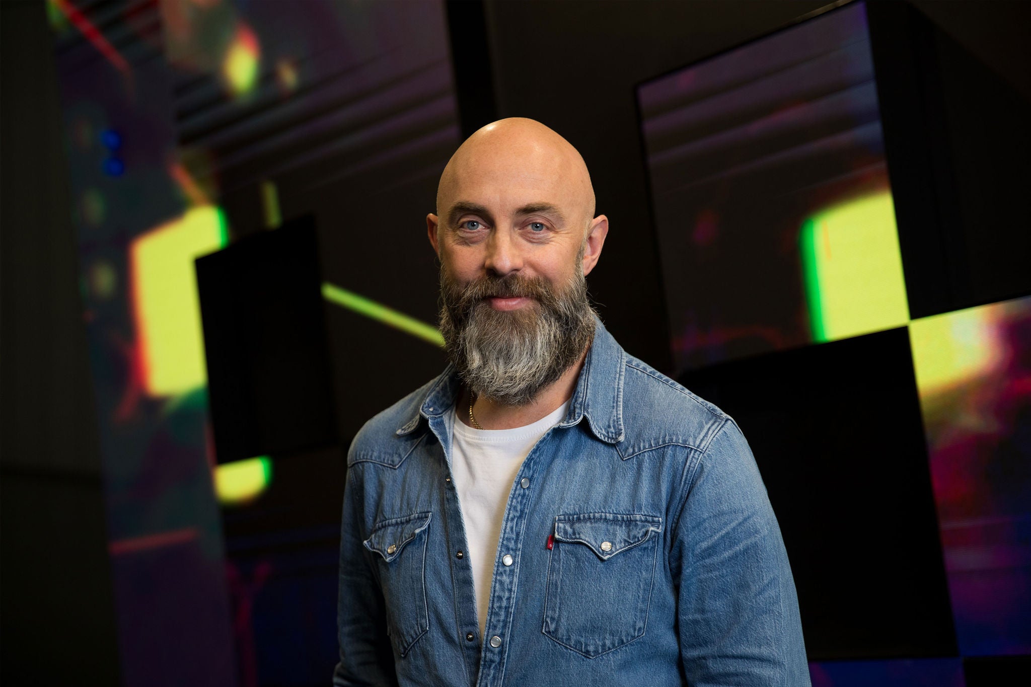 Person standing in front of a digital wall
