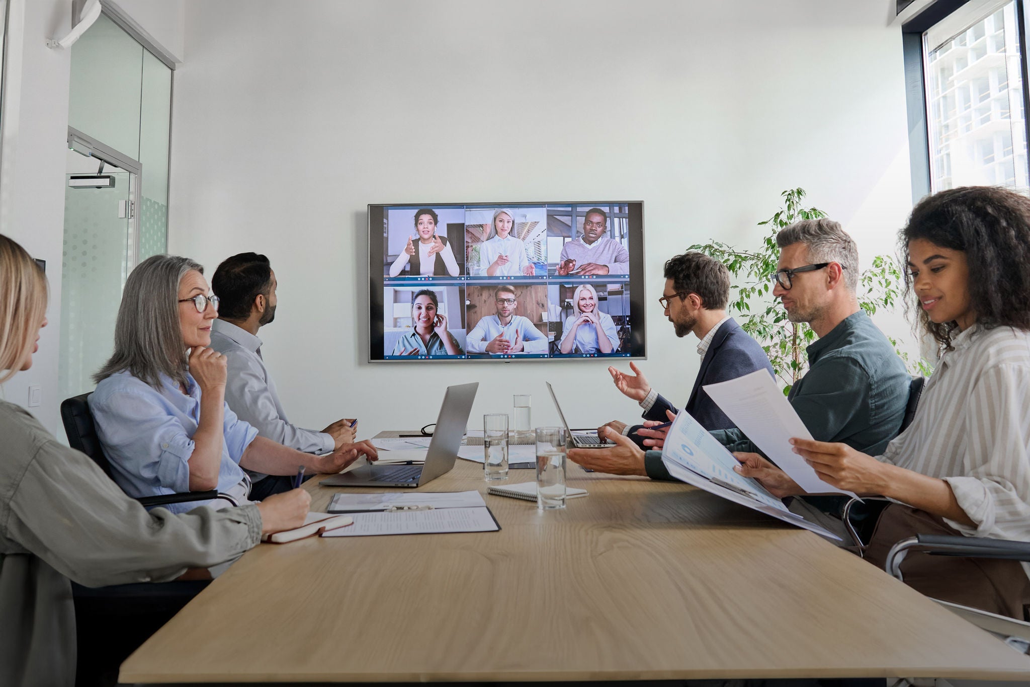 Diverse employees on online conference