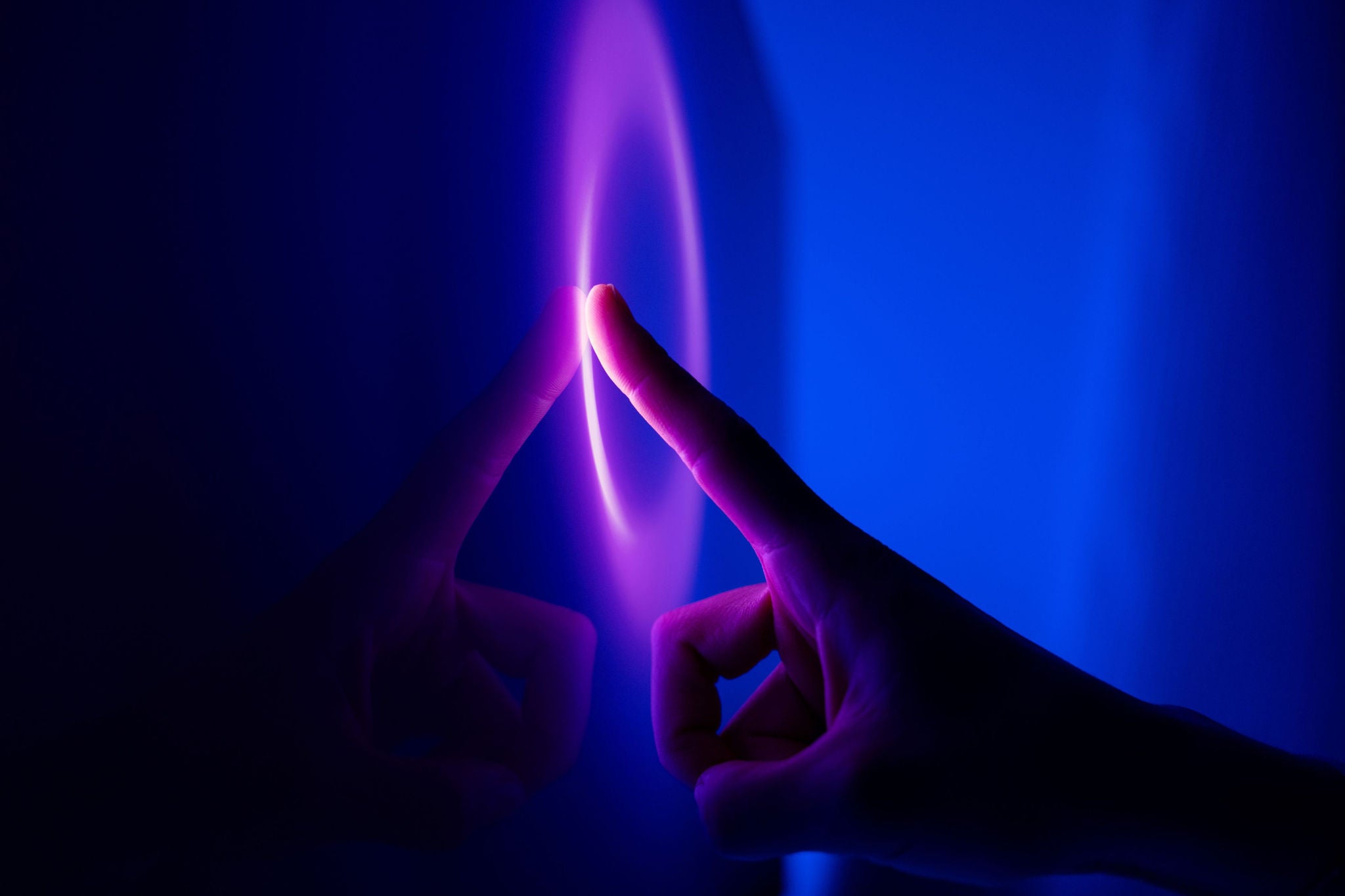 Close-up shot of click the glowing circle in dark