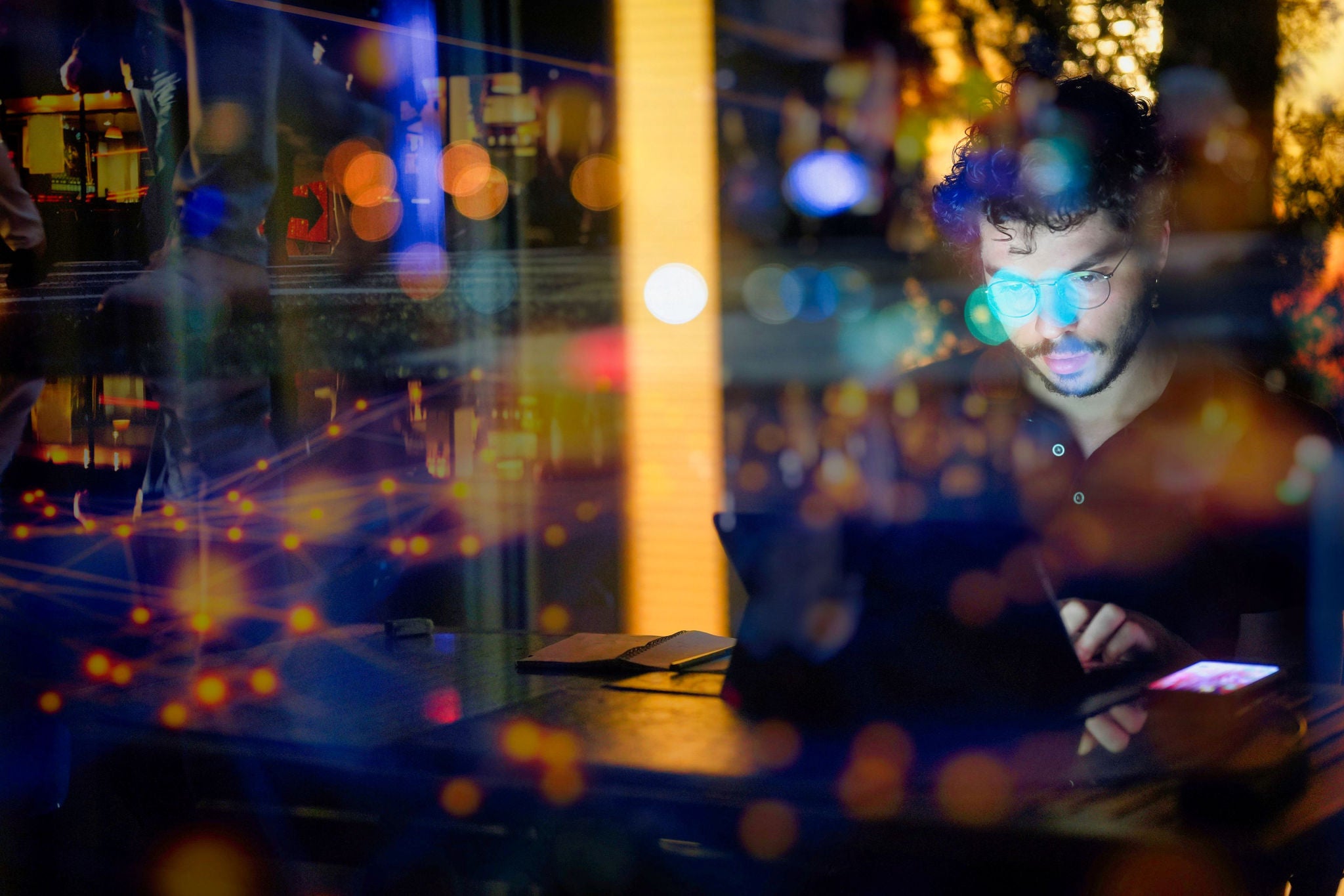 Landscape photograph of a computer programmer working on his computer