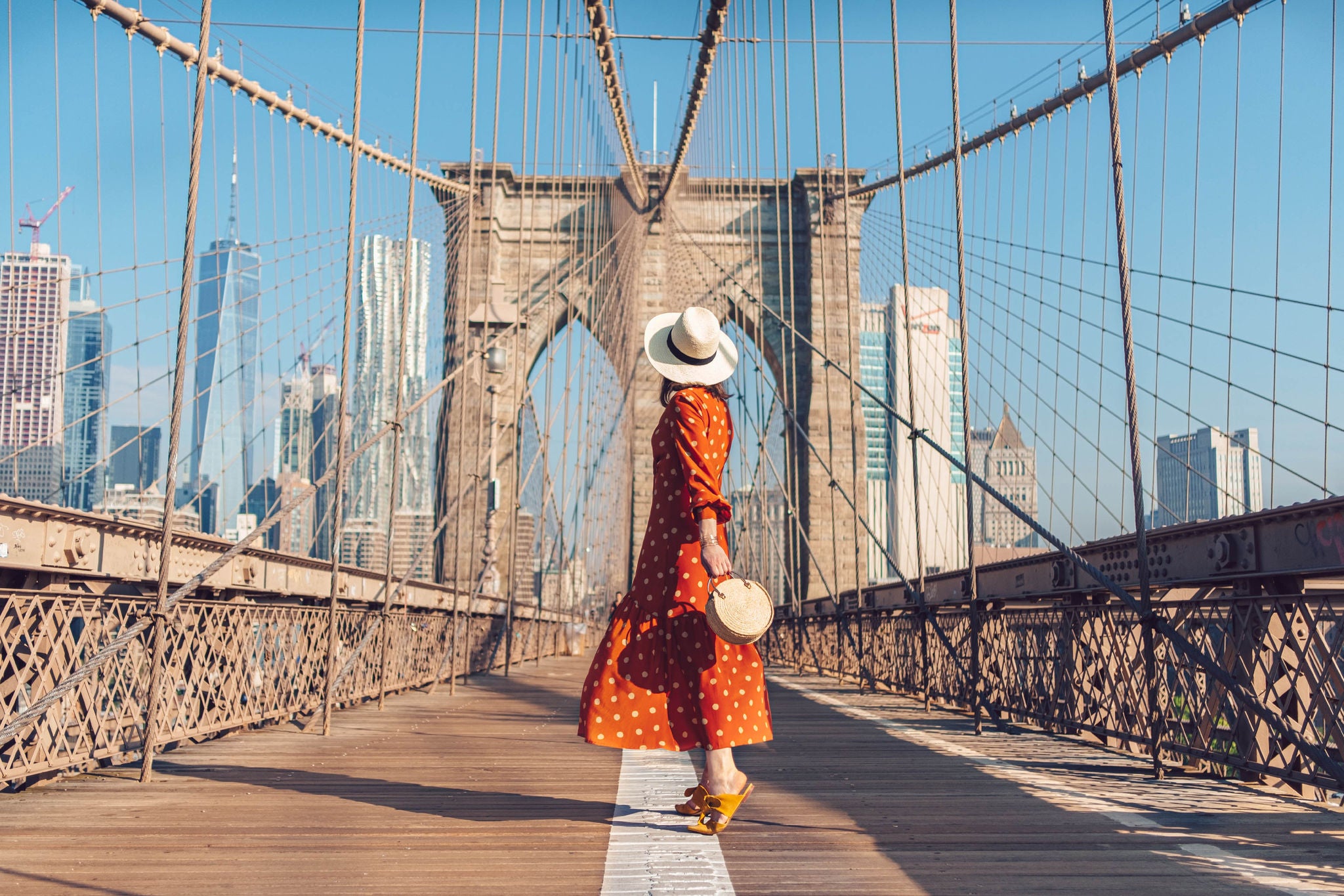 Young tourist on the Brooklyn Bridge