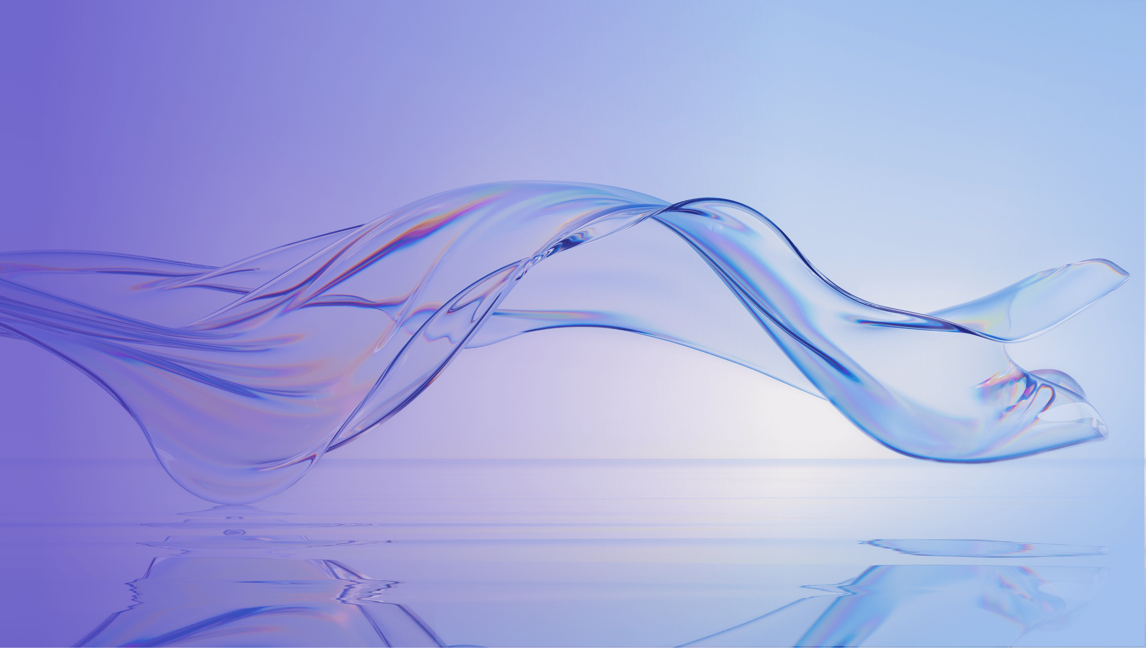 Man working on laptop while sitting in kitchen at home