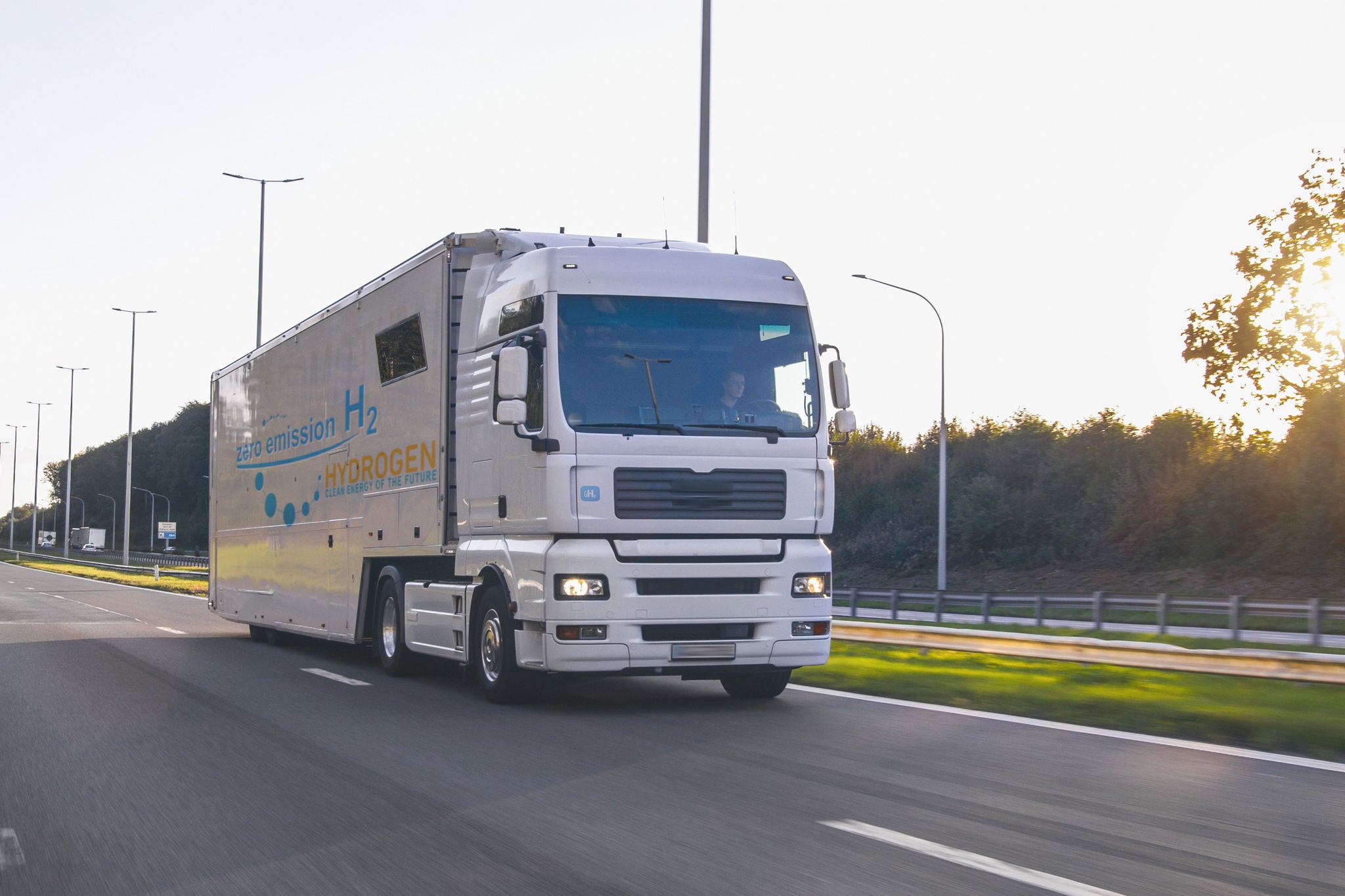 Hydrogen-powered truck driving on a highway