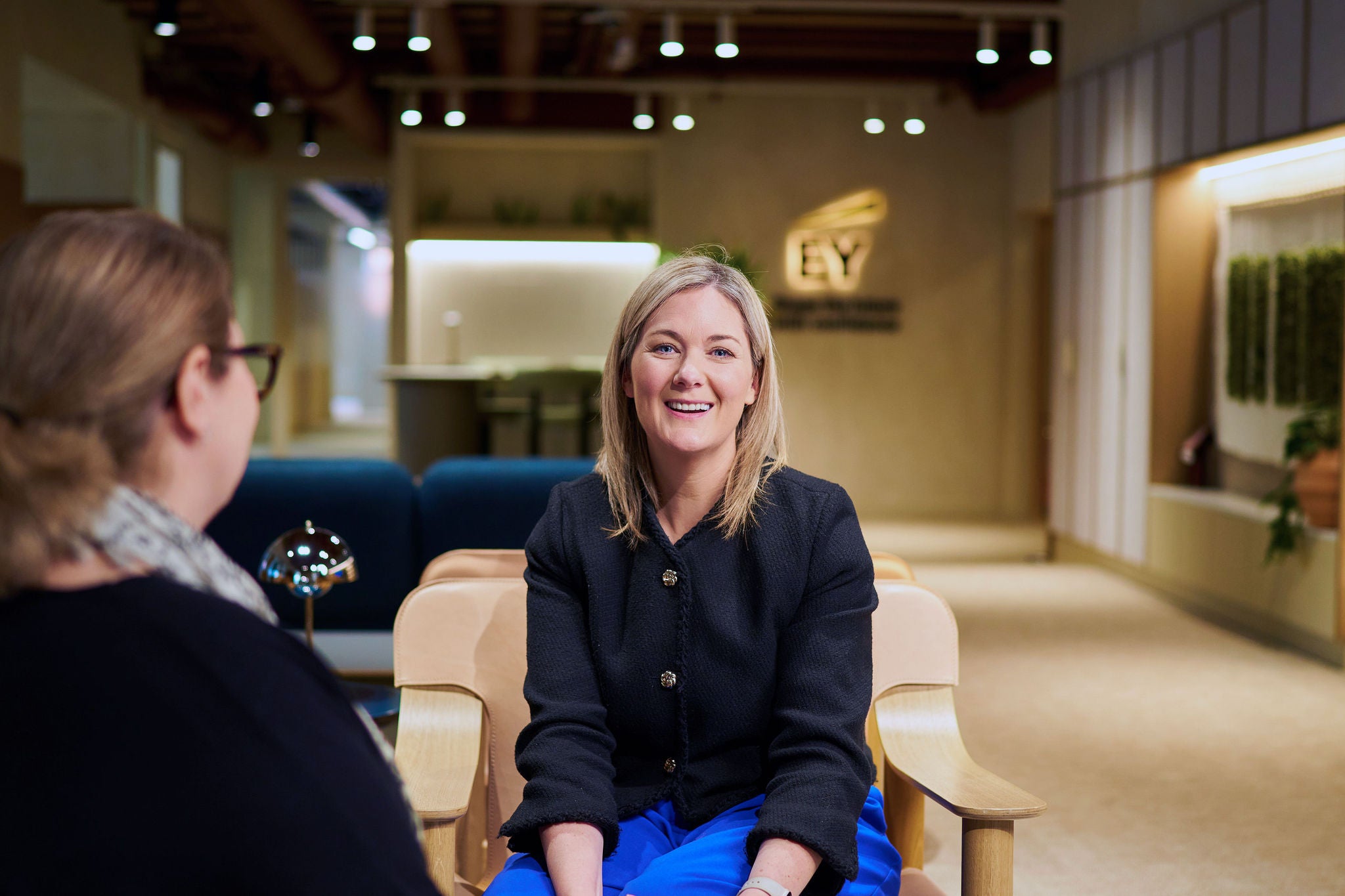Person sitting in the office smiling